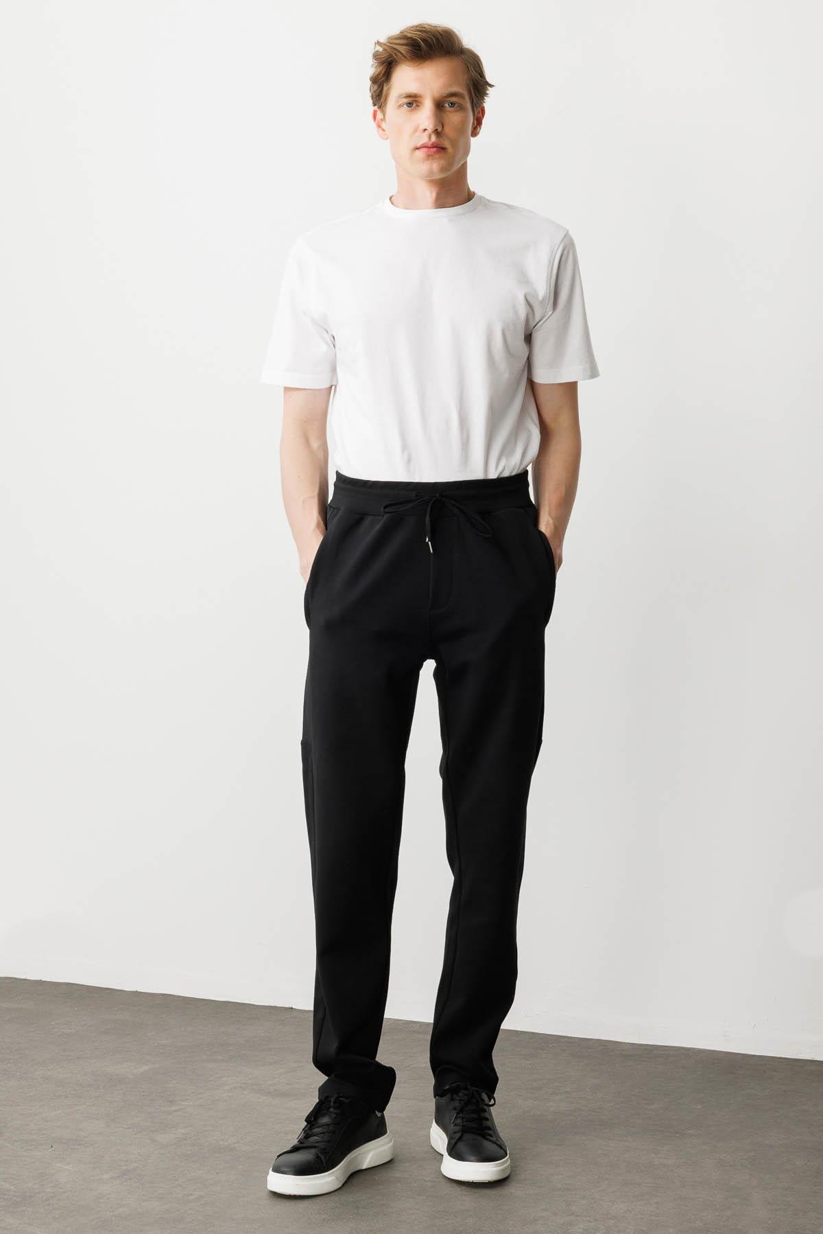 25448Erkek Yanı ve Cebi Kumaş Eşofman Altı Siyah