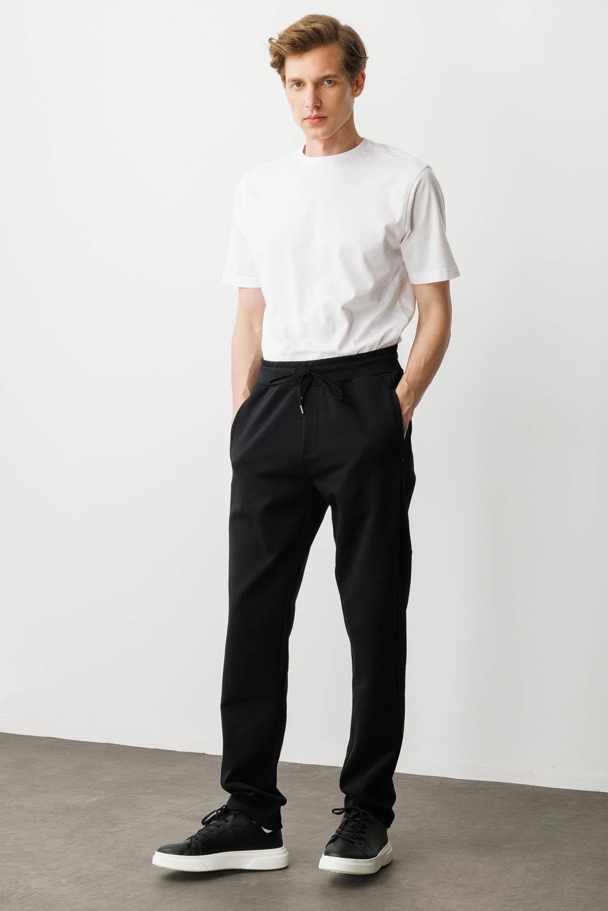 25448Erkek Yanı ve Cebi Kumaş Eşofman Altı Siyah