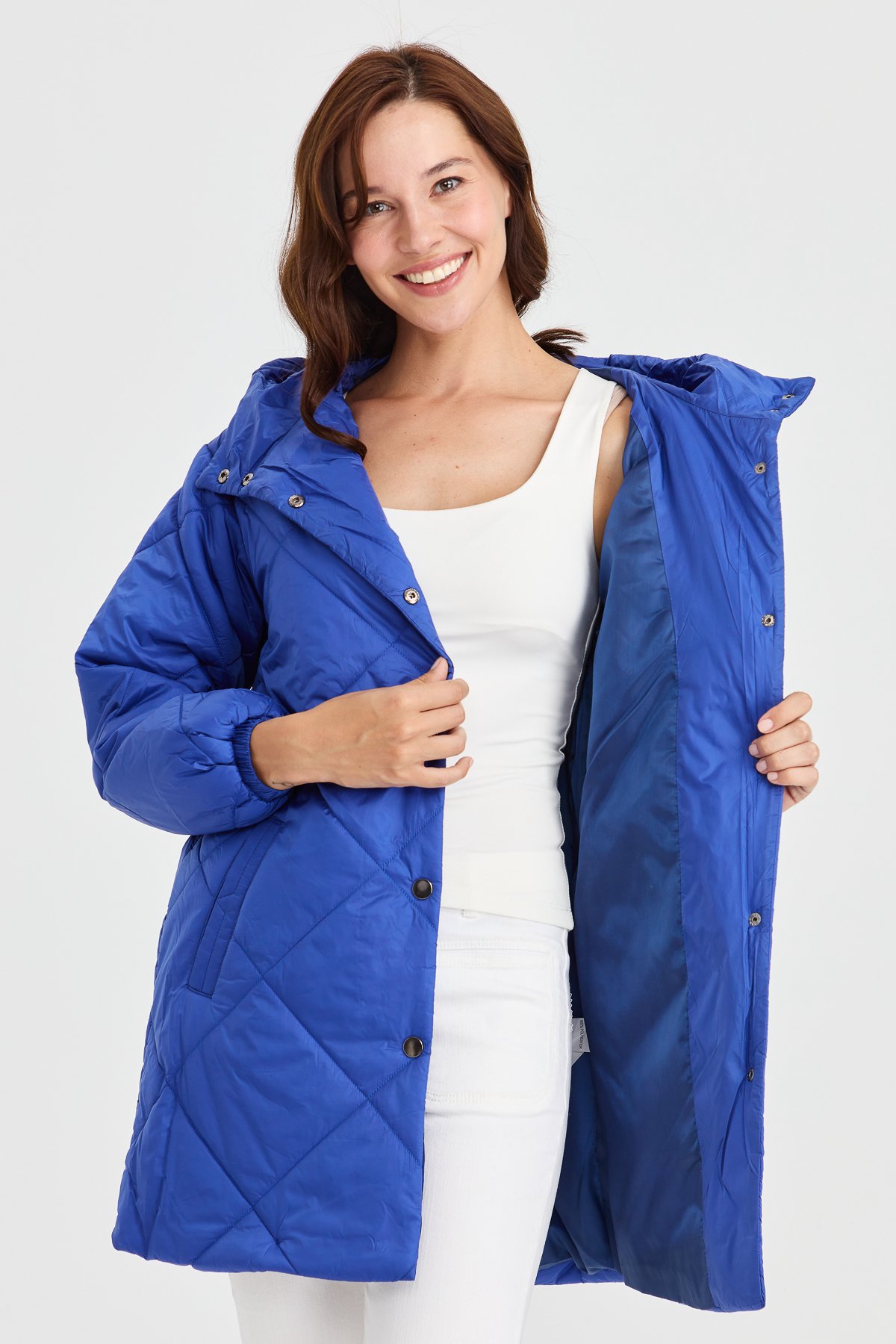 23403Kadın Şişme Kareli Uzun Kaban Saks