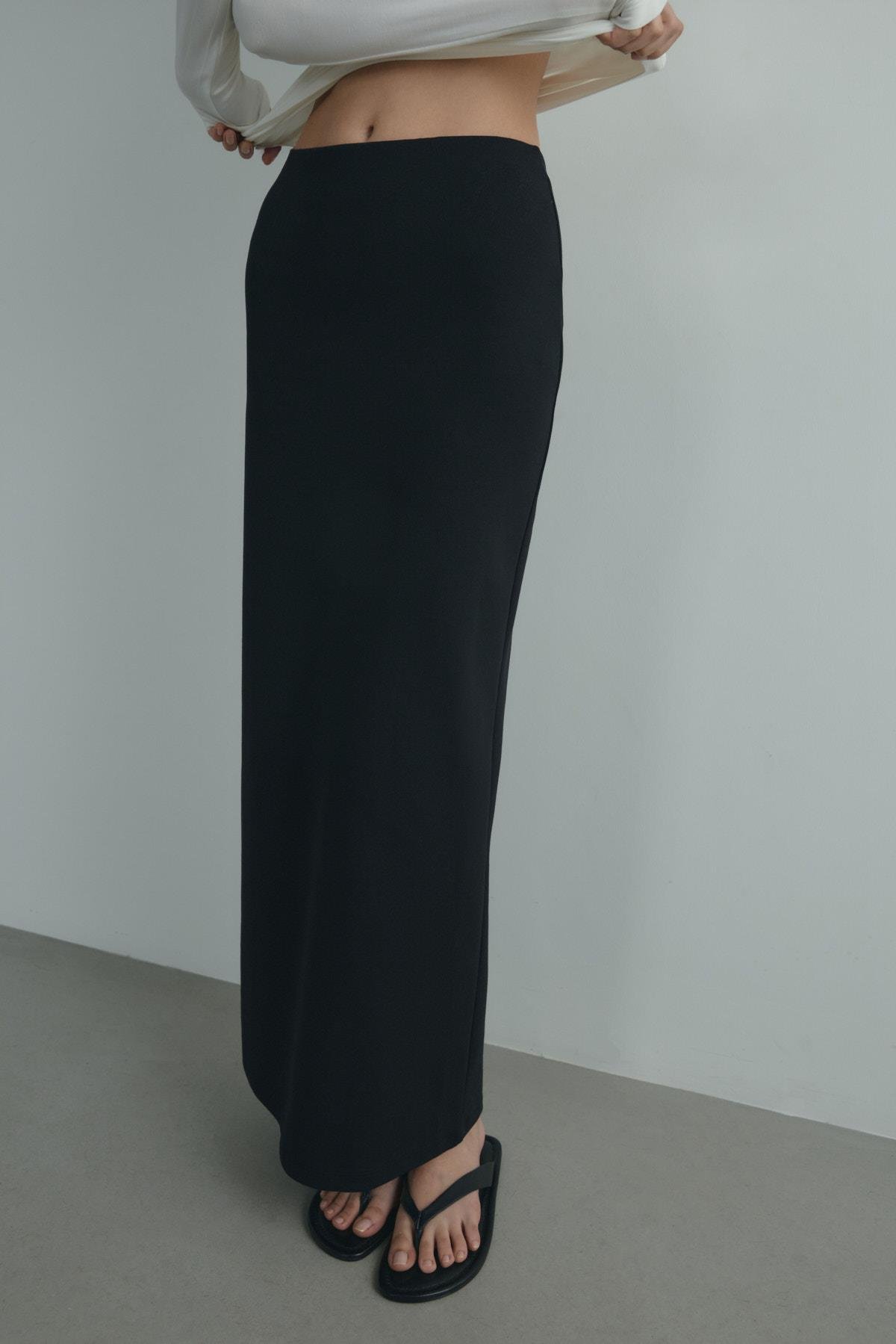 Siyah Toparlayıcı Kalem Etek