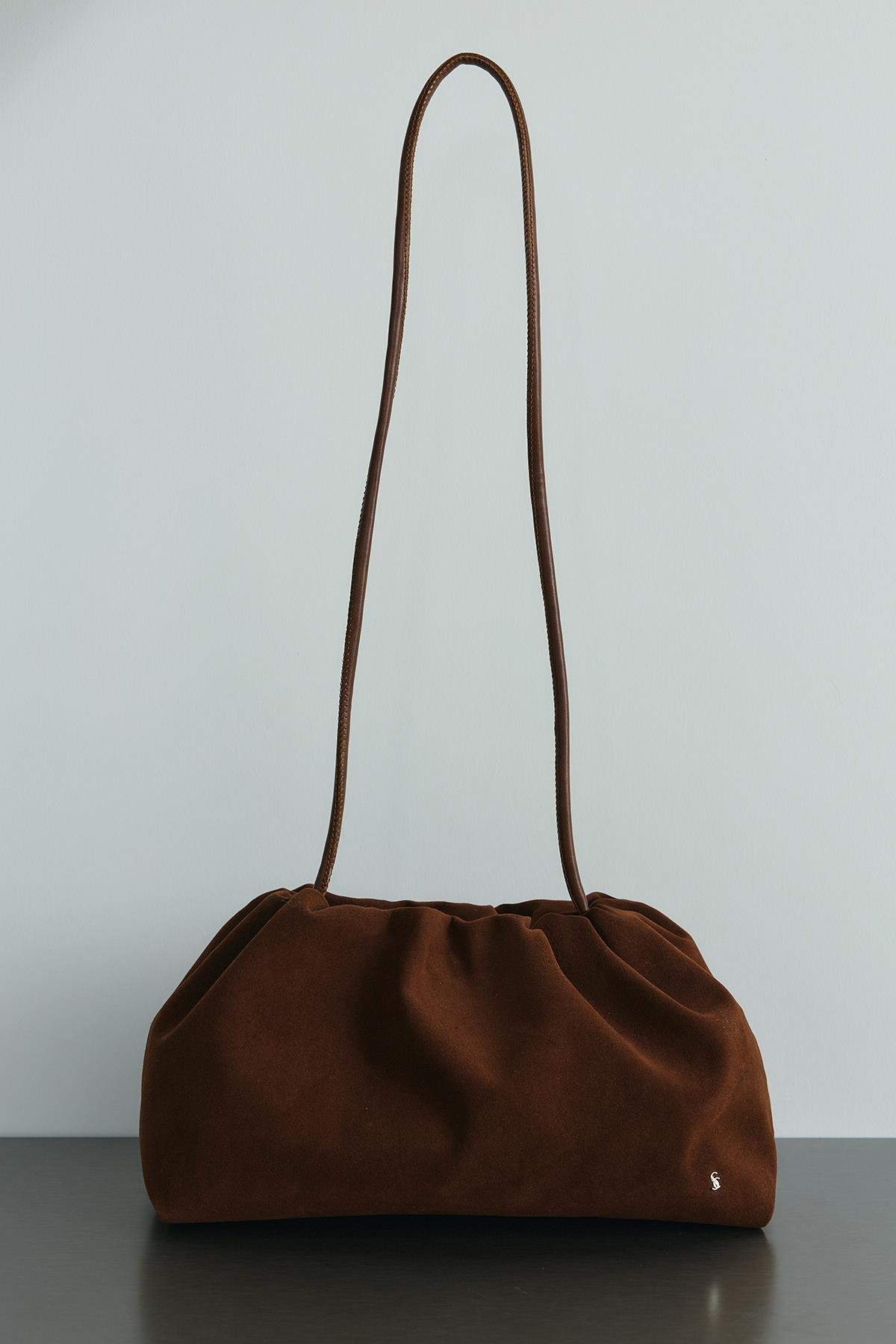 Taba Cove Büzgülü El Çantası