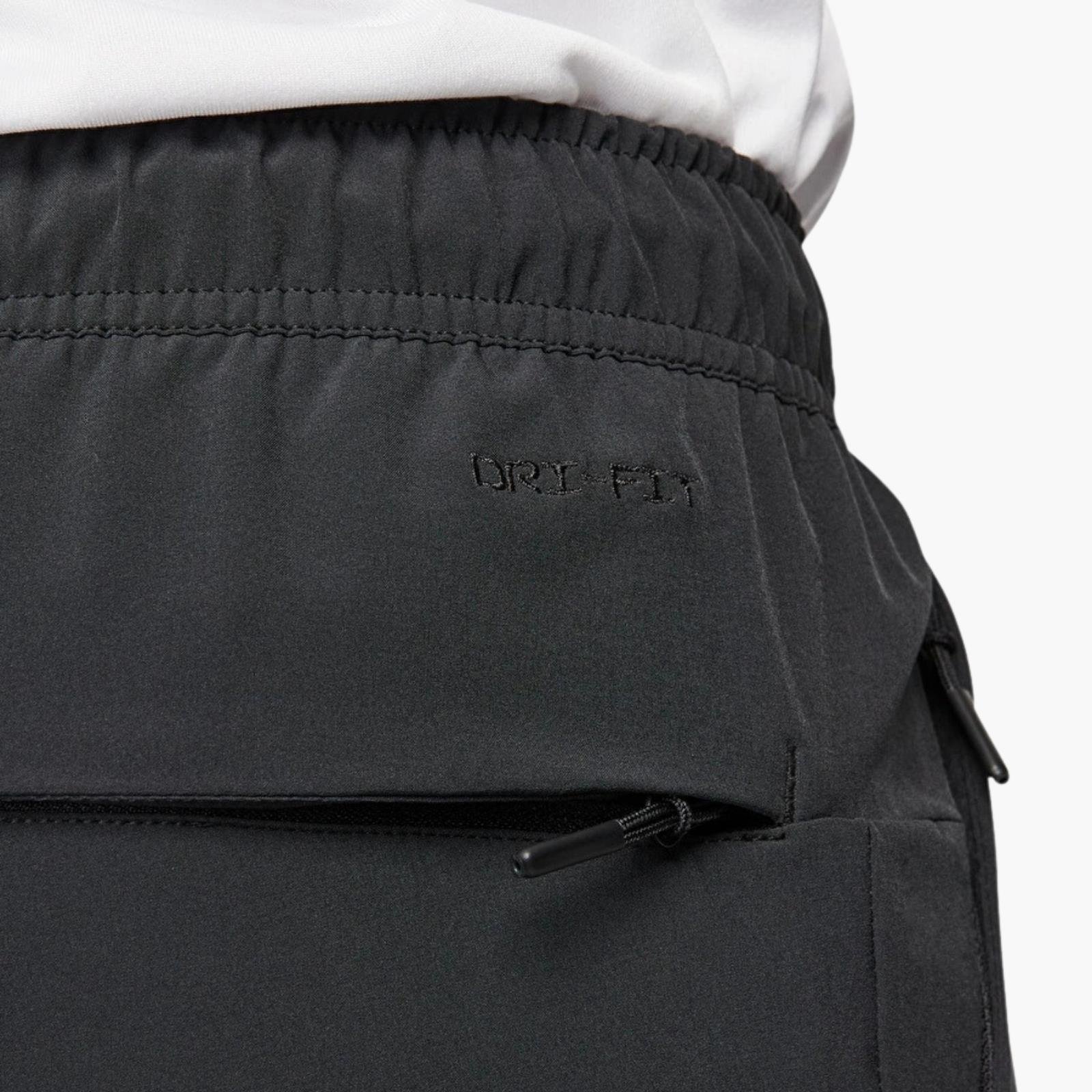 Nike Dri-FIT Unlimited Bileğe Doğru Daralan Eşofman Altı