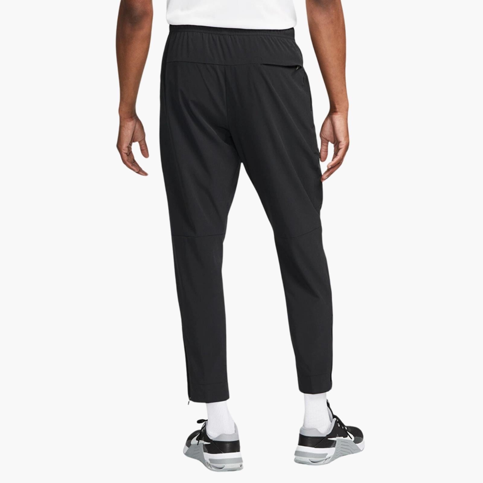 Nike Dri-FIT Unlimited Bileğe Doğru Daralan Eşofman Altı