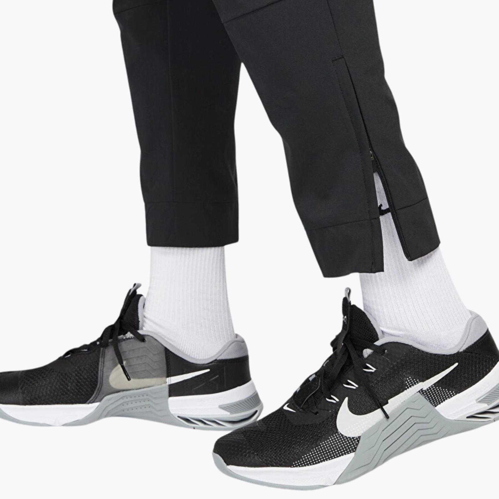 Nike Dri-FIT Unlimited Bileğe Doğru Daralan Eşofman Altı