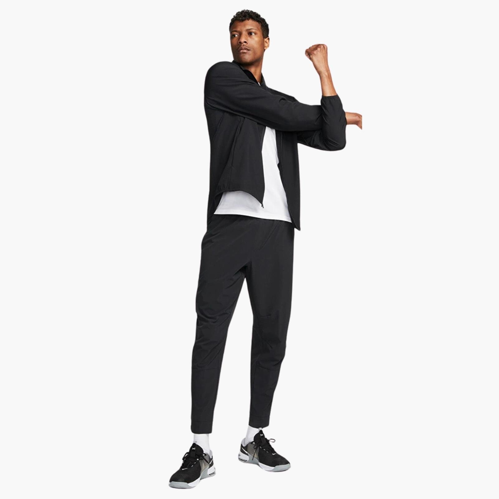 Nike Dri-FIT Unlimited Bileğe Doğru Daralan Eşofman Altı