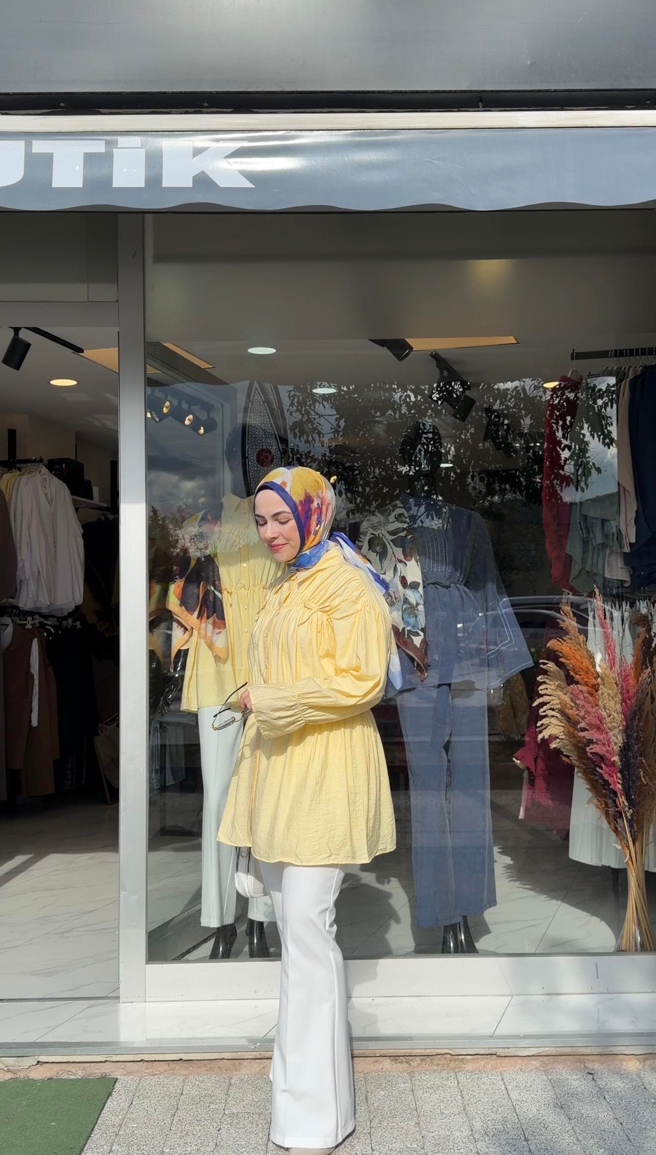 SARI RENK FİYONK DETAYLI BÜZGÜLÜ KIRİNKIL KUMAŞ ROMANTİK GÖMLEK 