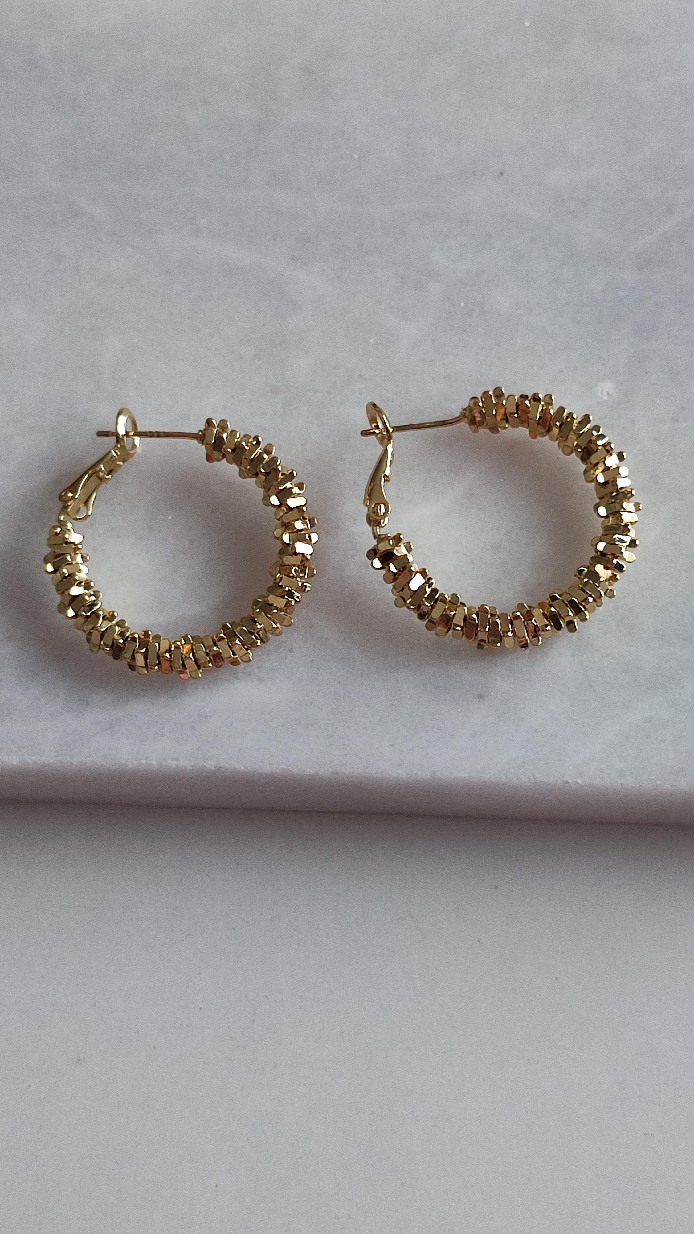 ÇELİK GOLD ŞEKİLLİ HALKA KÜPE 