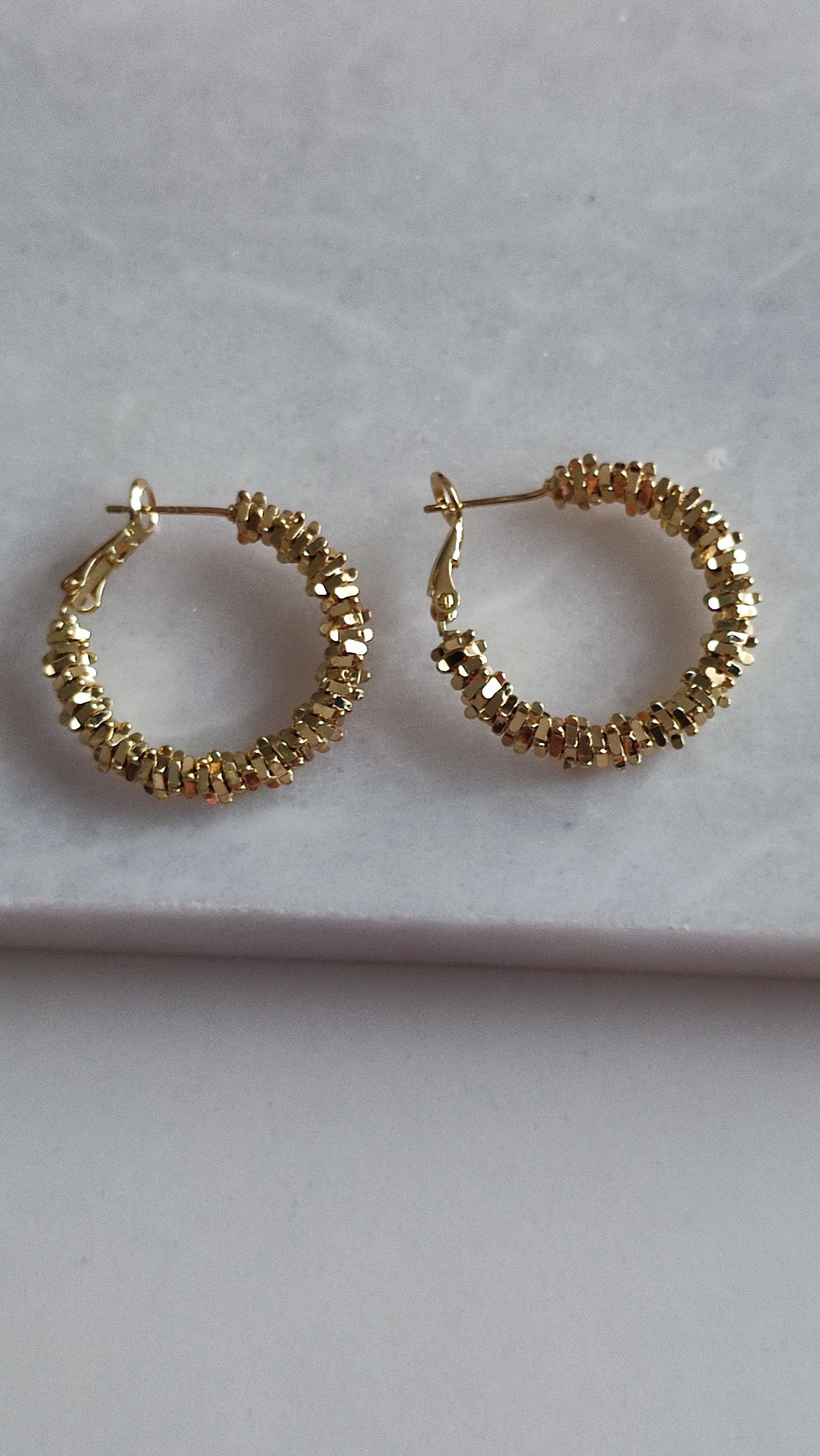 ÇELİK GOLD ŞEKİLLİ HALKA KÜPE 