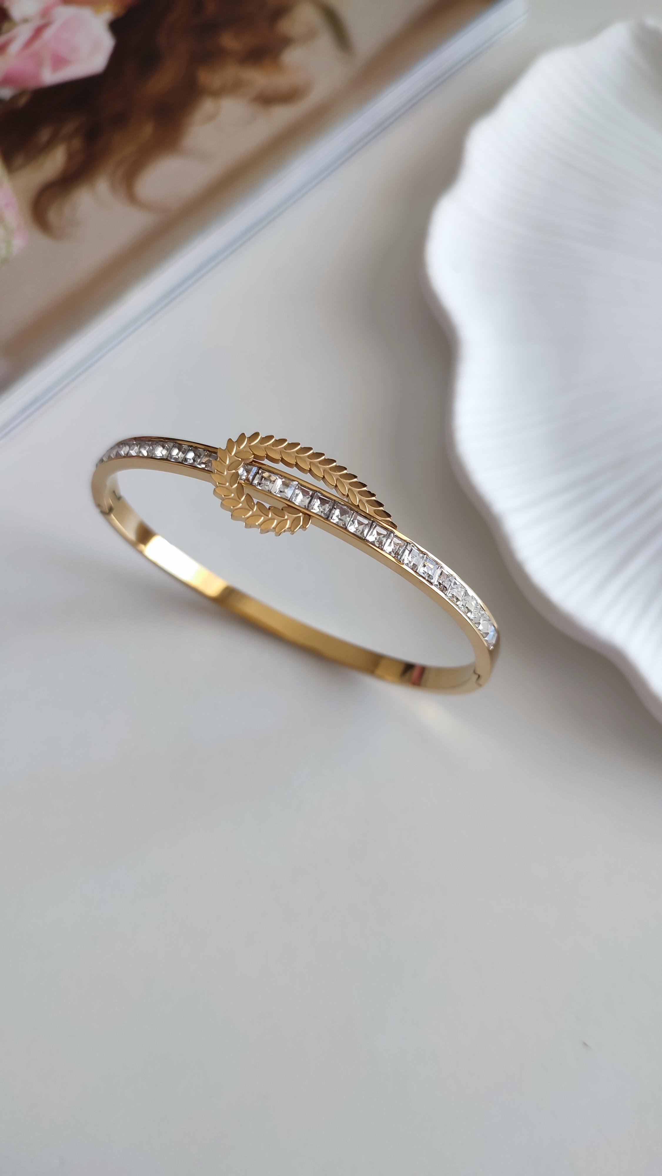 ÇELİK GOLD UZERİ TAŞLI KELEPÇE 