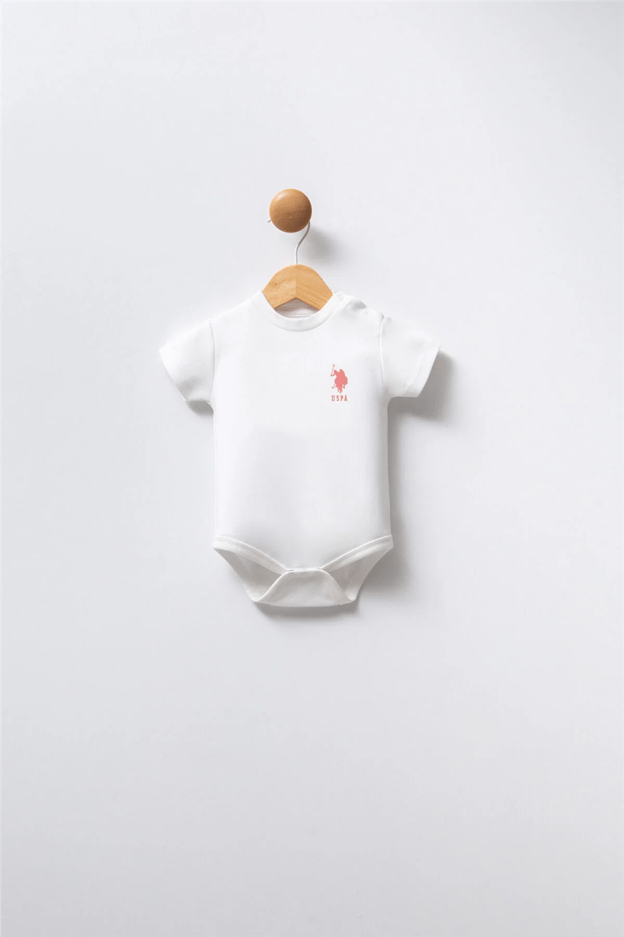 U.S. Polo Assn. Kız Bebek Pamuklu Bisiklet Yaka Pigment Baskılı Yazlık Regular Fit  Badi Zıbın 3-24 Ay Pudra