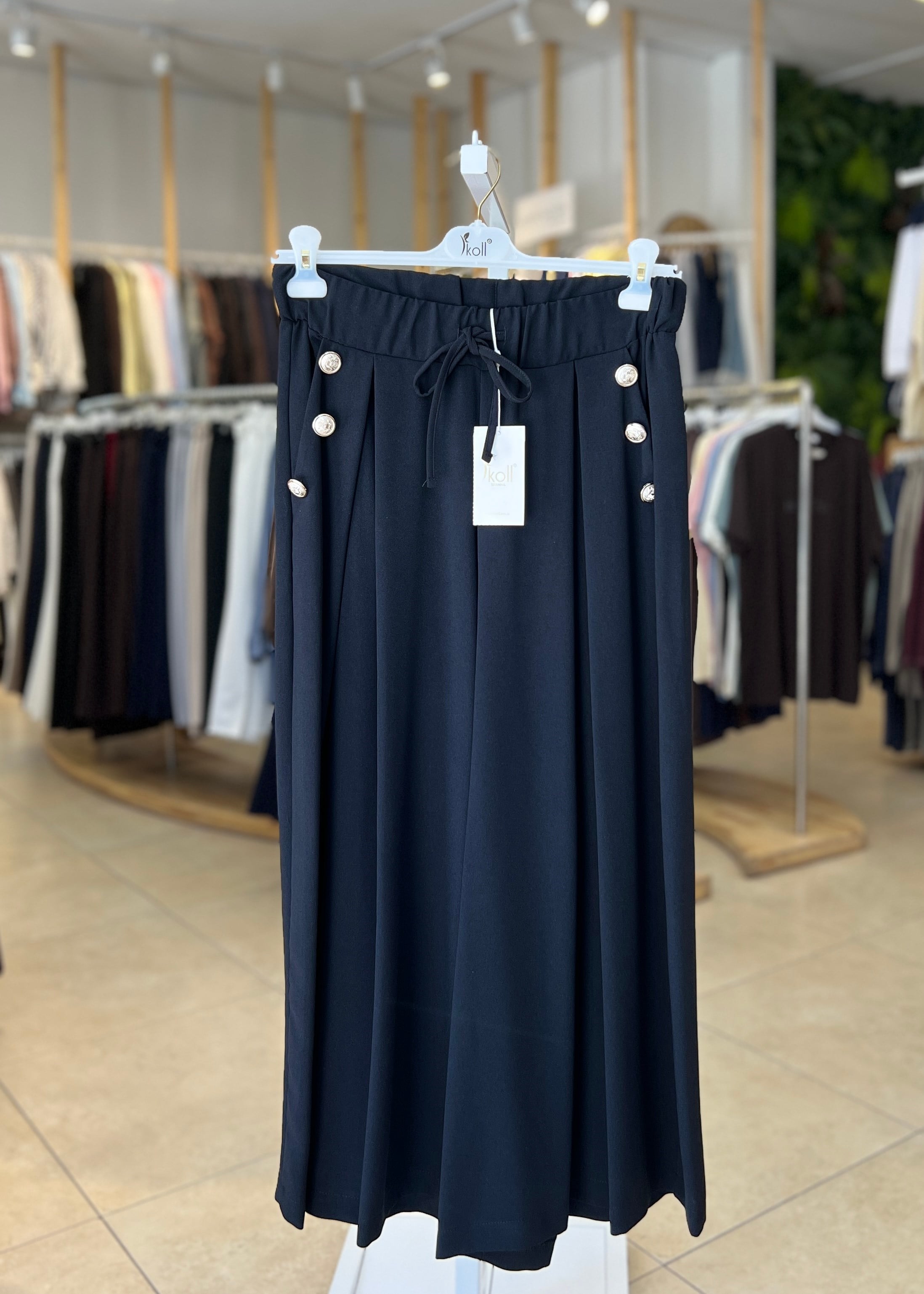 DÜĞME DETAYLI PİLİSELİ BOL PAÇA PANTOLON