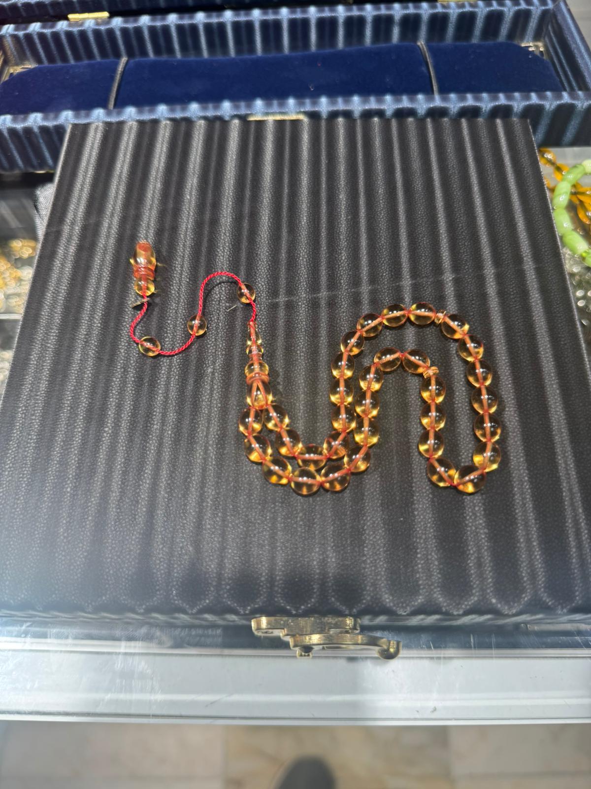 Şeffaf Sarı Ateş Kehribar Tesbih 6x9 mm Şeffaf Delim Usta İmzalı