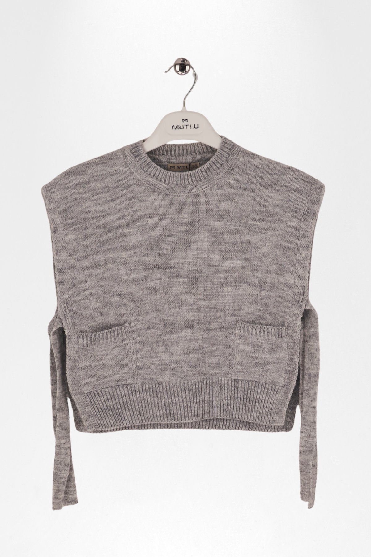 CEPLİ BAĞCIKLI KIZ TRİKO SÜVETER