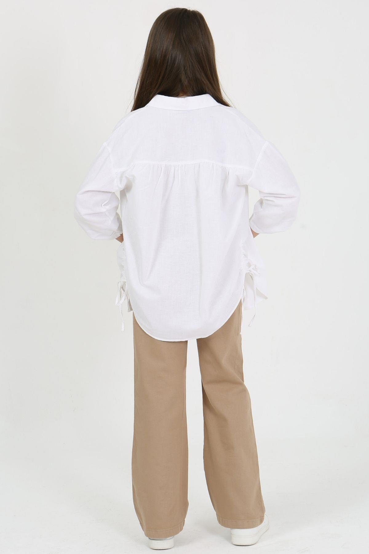 YANLARI BÜZMELİ KIZ KETEN GÖMLEK