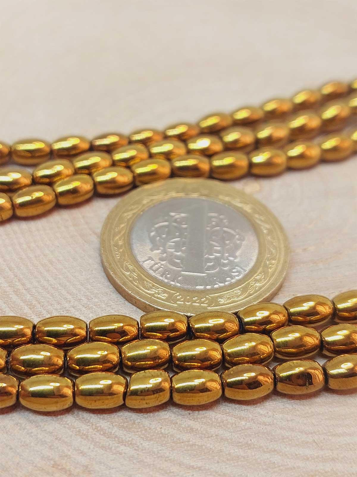 Çeyrek Dizi (9cm uzunluğundadır!) Hematit Taşı Arpa Kesim Çeyrek Dizi 4*5.5mm (49642)