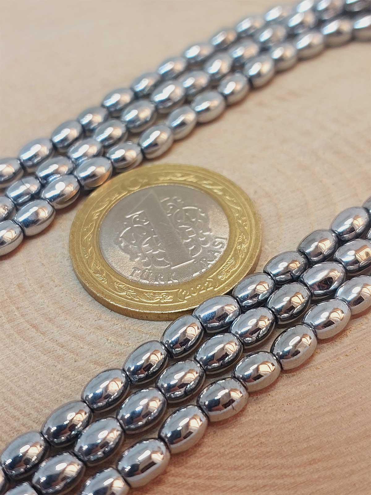 Çeyrek Dizi (9cm uzunluğundadır!) Hematit Taşı Arpa Kesim Çeyrek Dizi 4*5.5mm (49640)