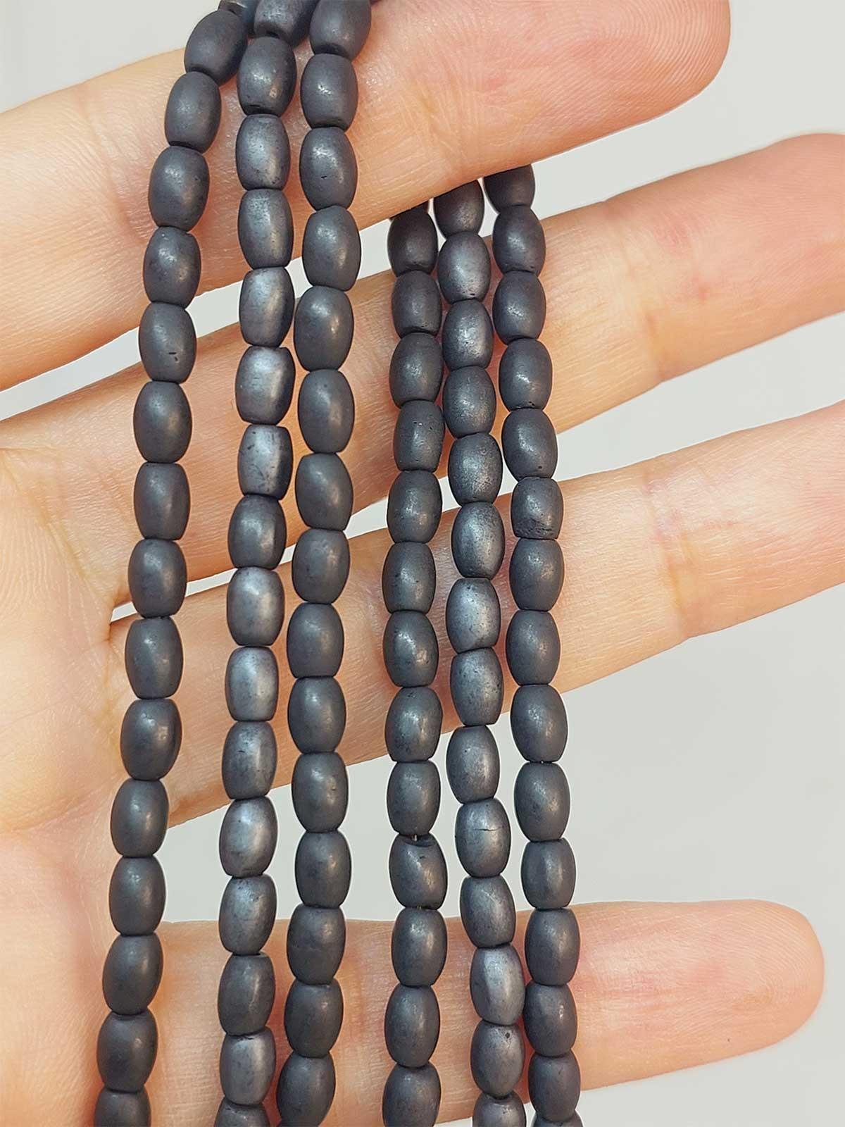 Çeyrek Dizi (9cm uzunluğundadır!) Hematit Taşı Arpa Kesim Çeyrek Dizi 4*5.5mm (49636)