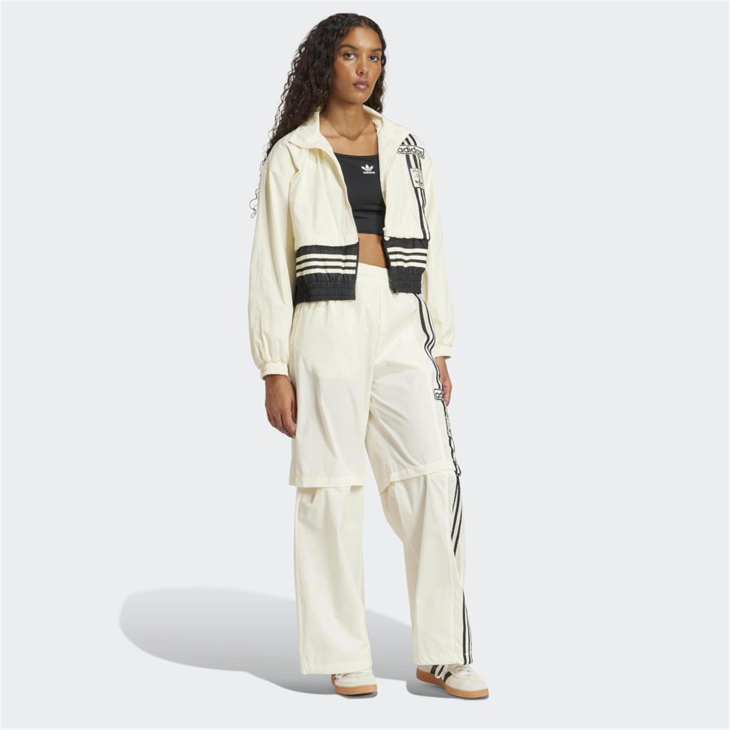 WOVEN TRACK TOP