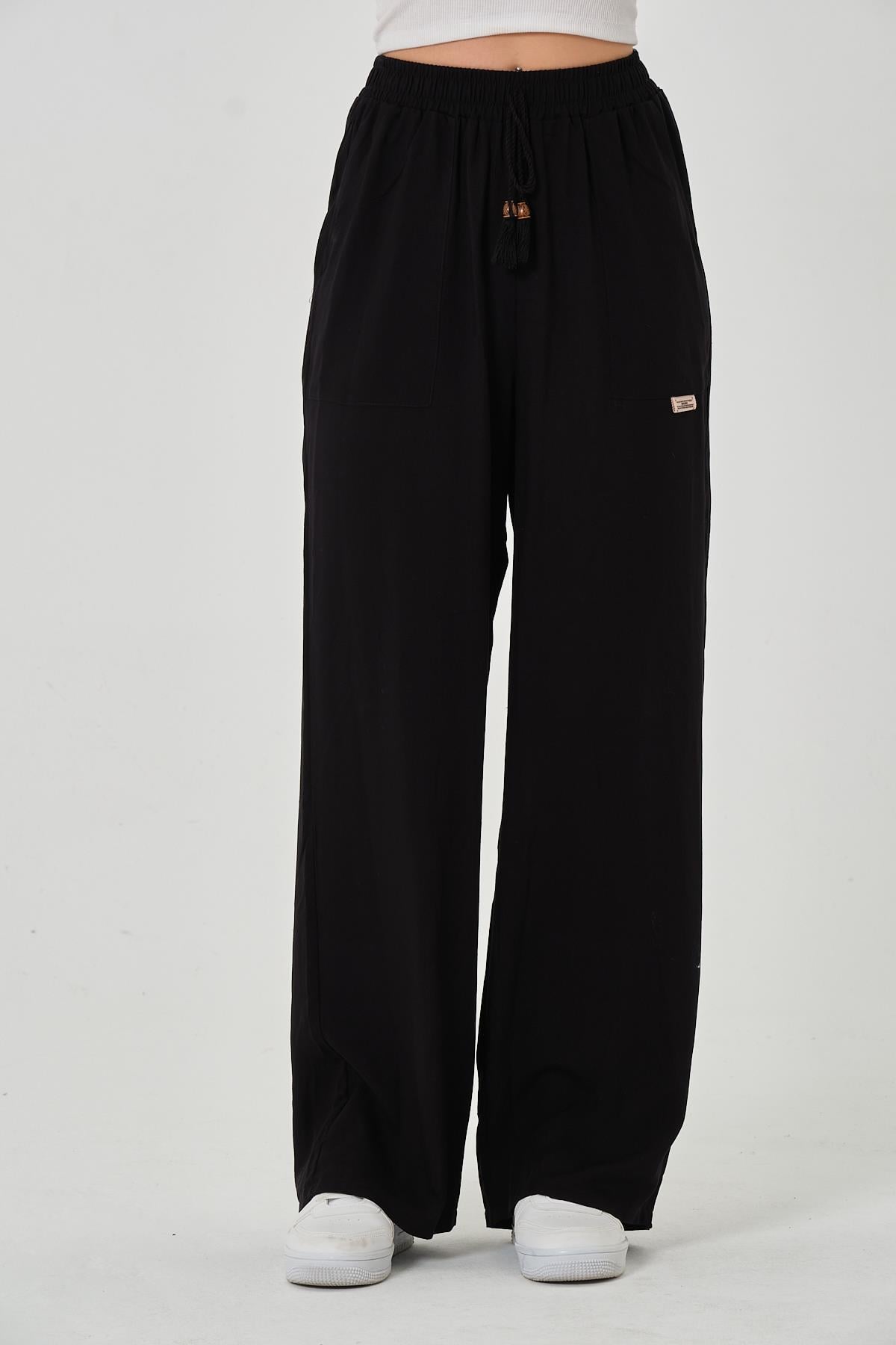 CEPLİ BOL PAÇA PANTOLON
