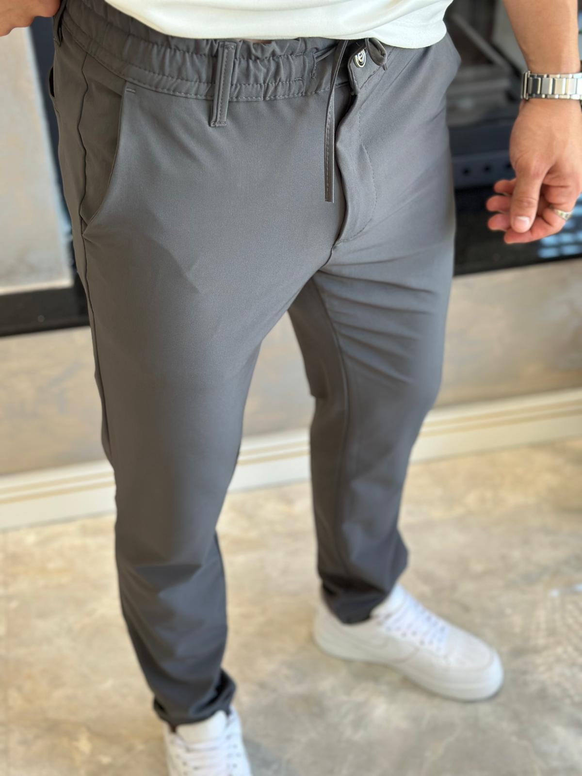 Erkek Slim Fit Kalıp Beli Lastikli  ve Bağcıklı Paraşüt Kumaş Pantolon Taş Eca041