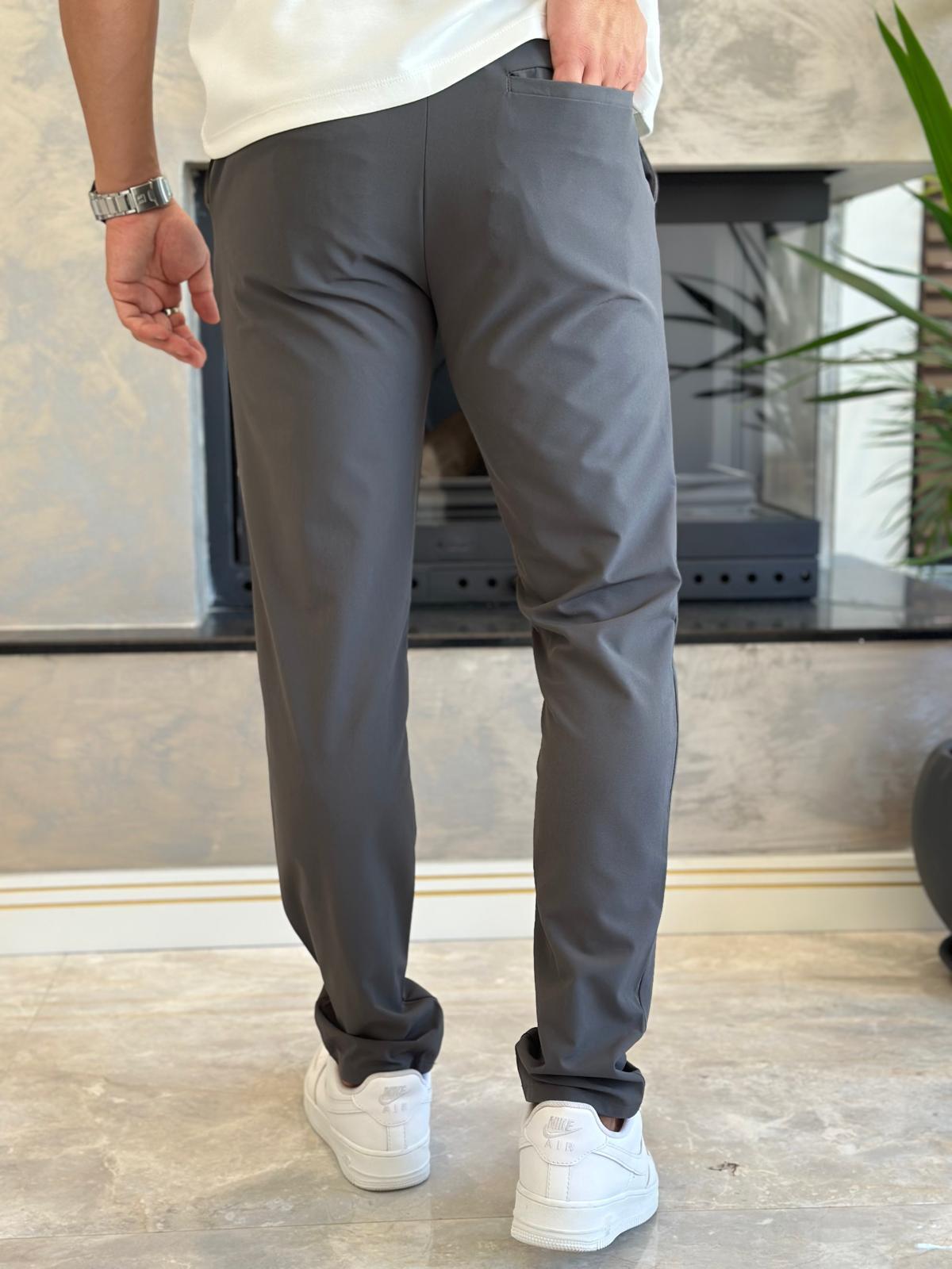 Erkek Slim Fit Kalıp Beli Lastikli  ve Bağcıklı Paraşüt Kumaş Pantolon Taş Eca041
