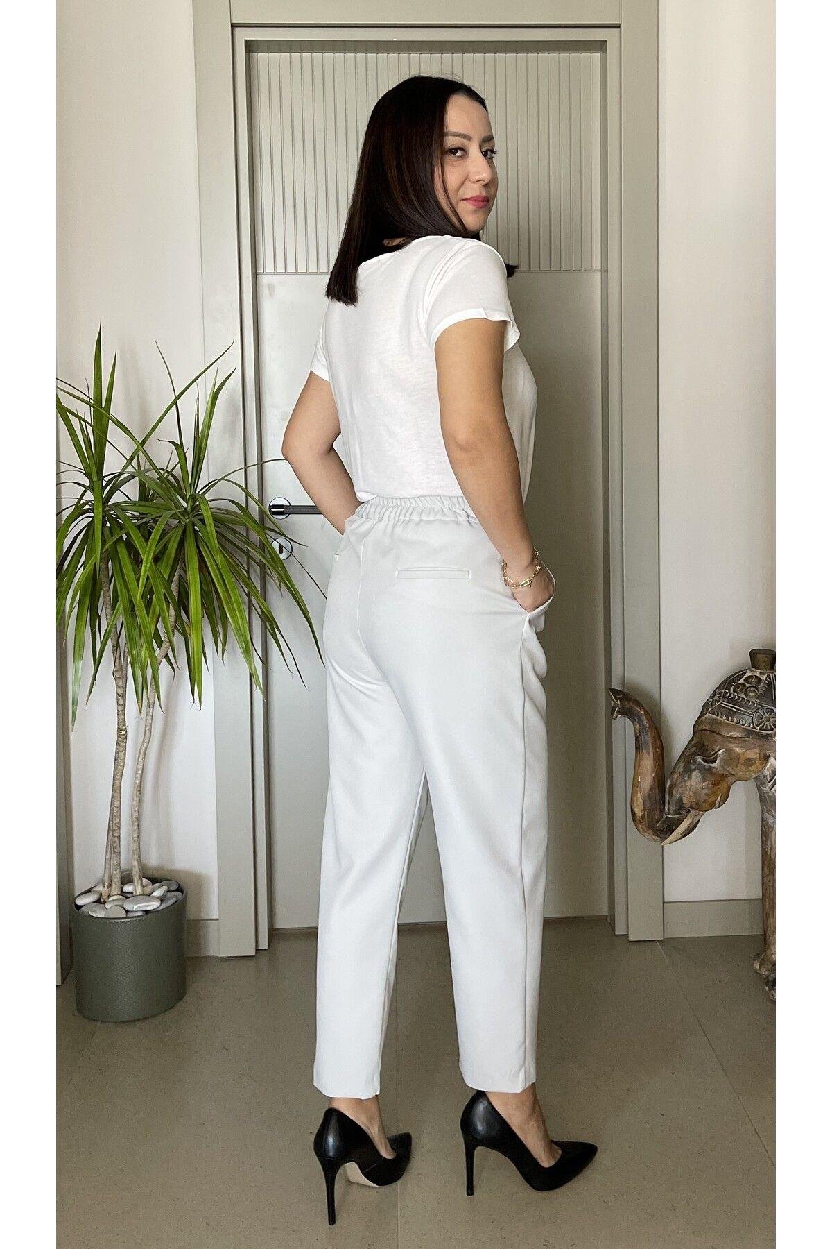 HAVUÇ MODEL BELİ LASTİKLİ YÜKSEK BEL CEPLİ PANTOLON