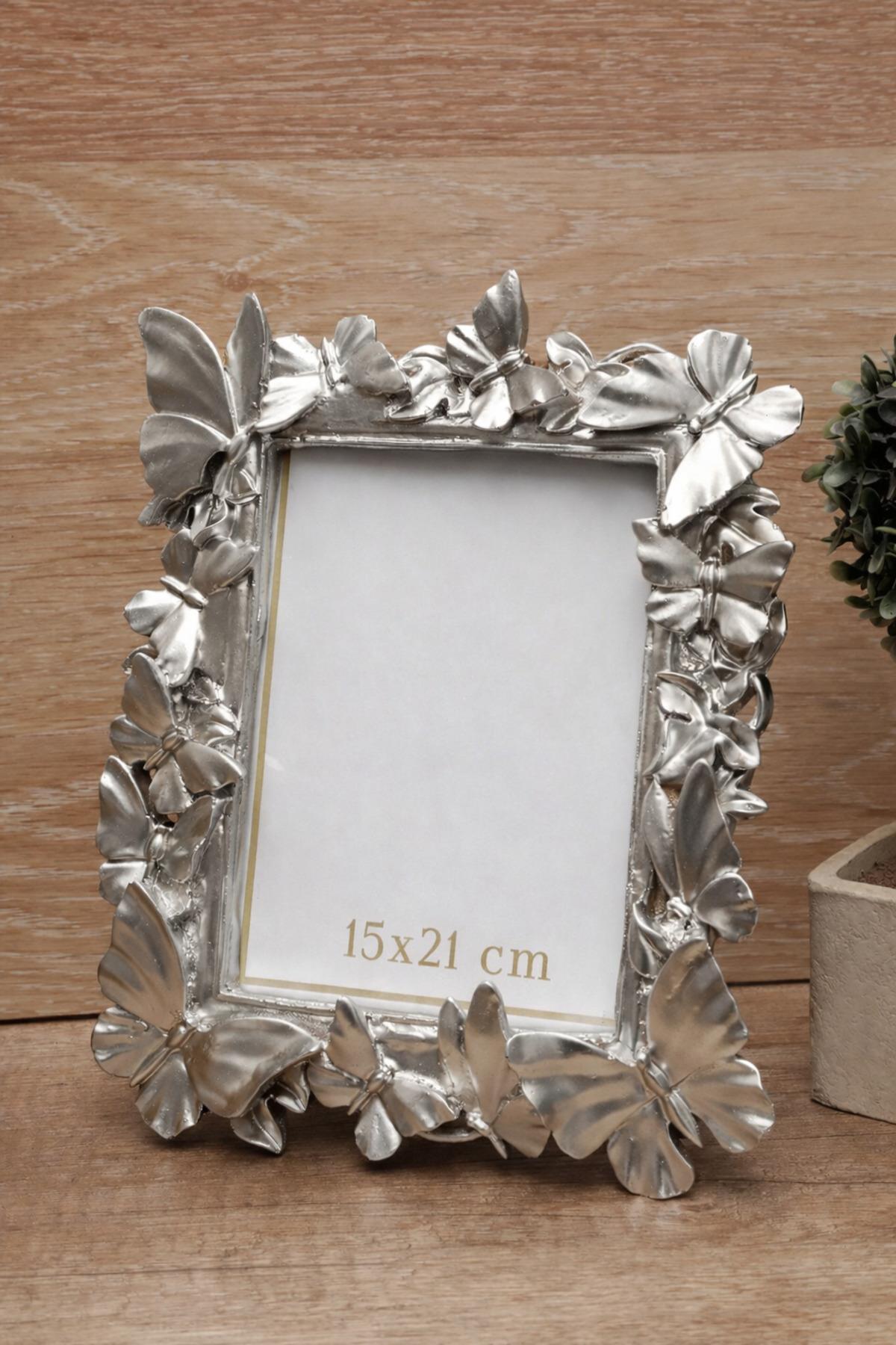 dekoratif-kelebek-desenli-sik-cerceve--2f-bea.jpg