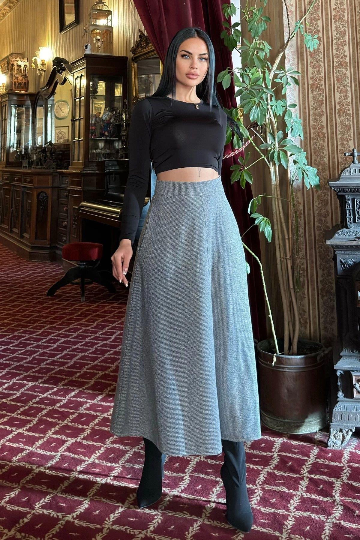 kadin-siyah-etek-700-3662-0bd91d.jpg