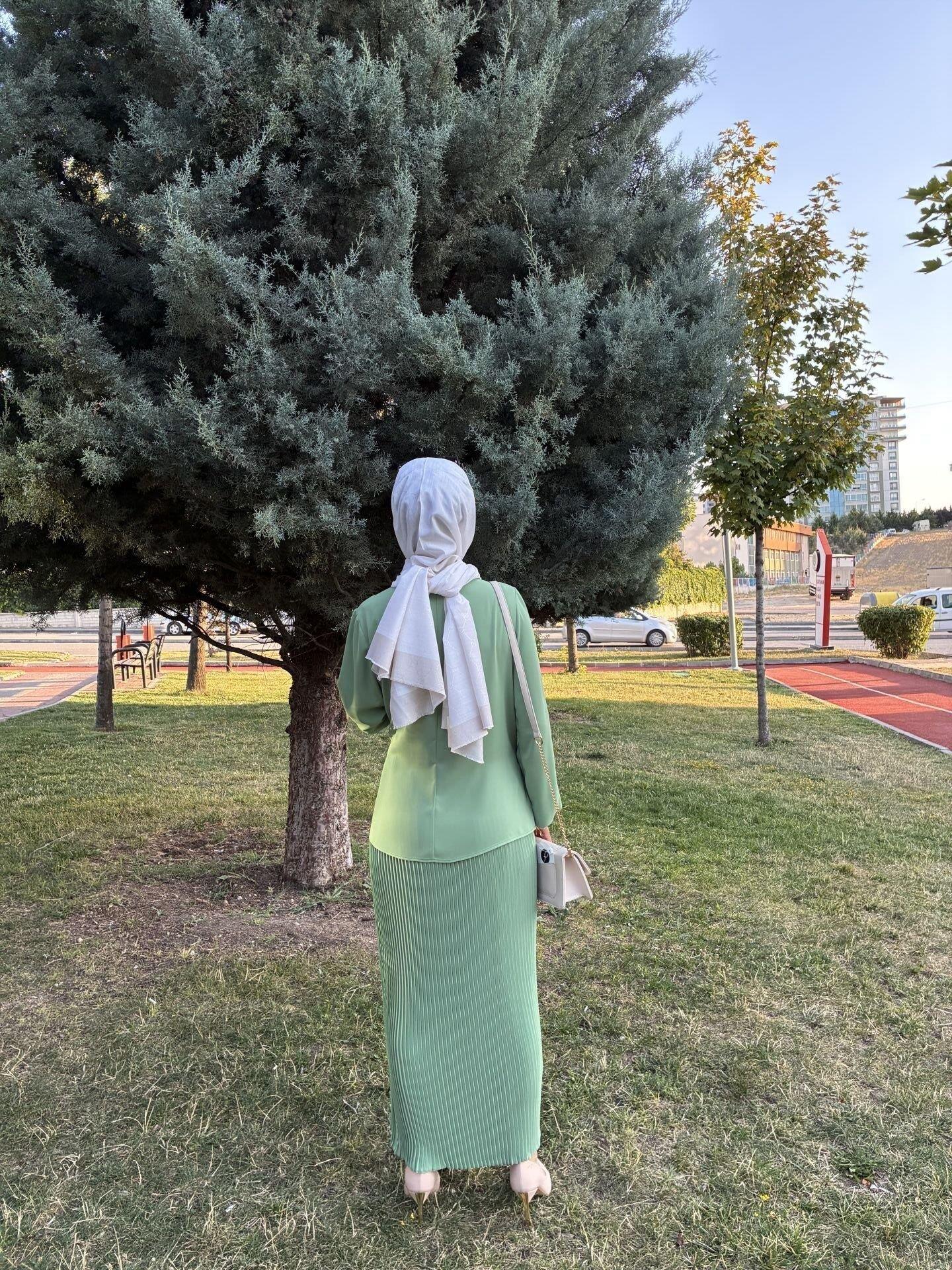 Pileli etekli Nihan marka takım