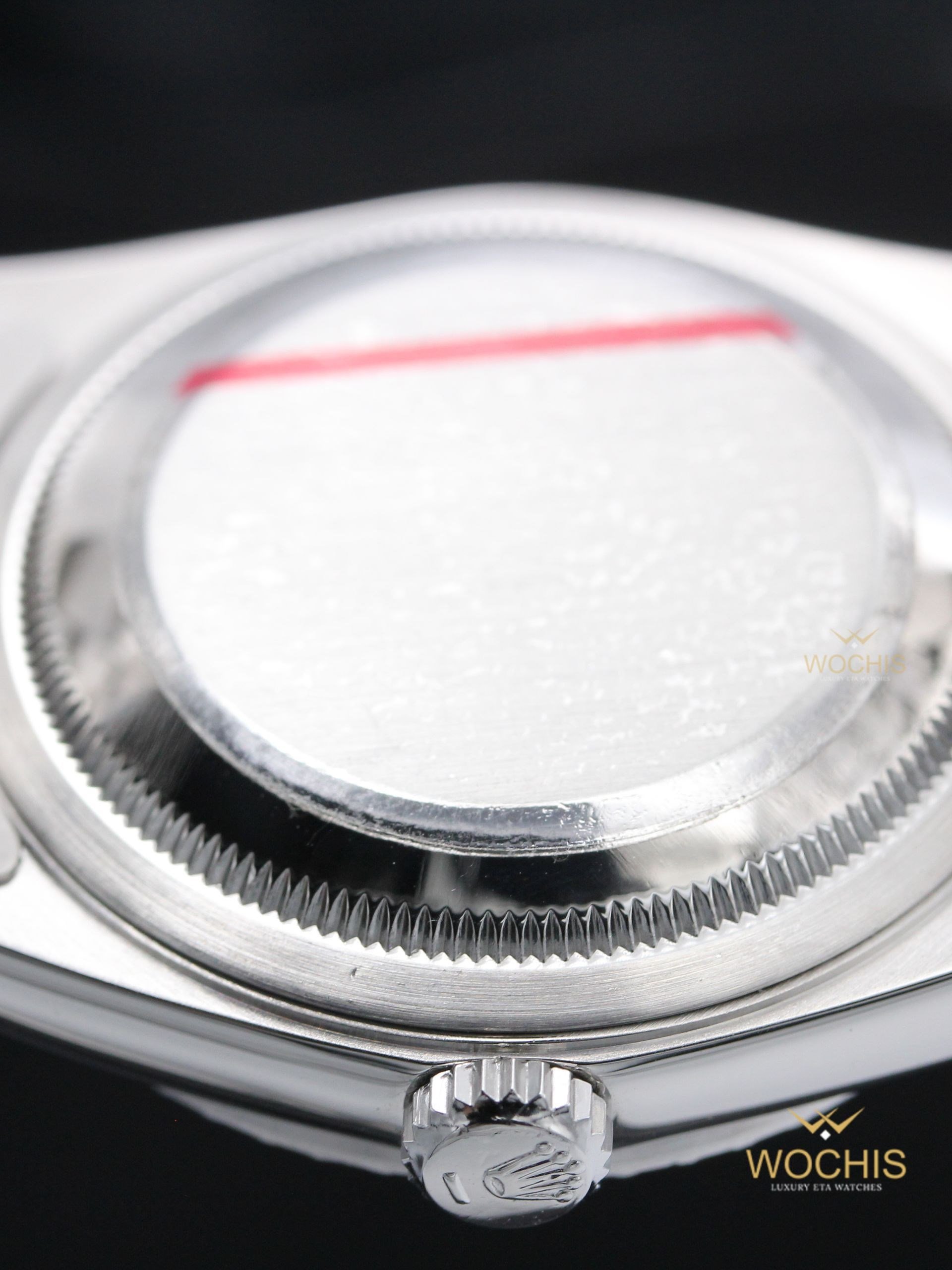 Rolex Datejust w. Engine Turned Bezel 16220-8353 (Stainless Steel - 36 - Silver Index)