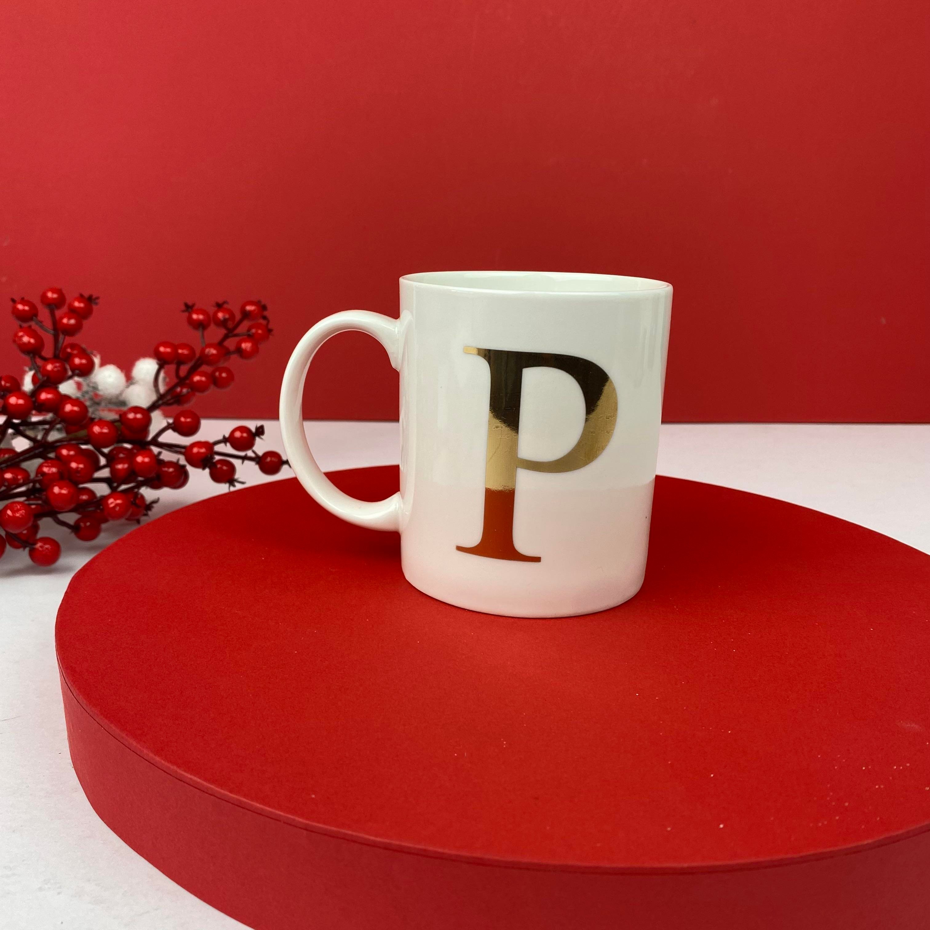 Beyaz porselen harfli kupa bardak