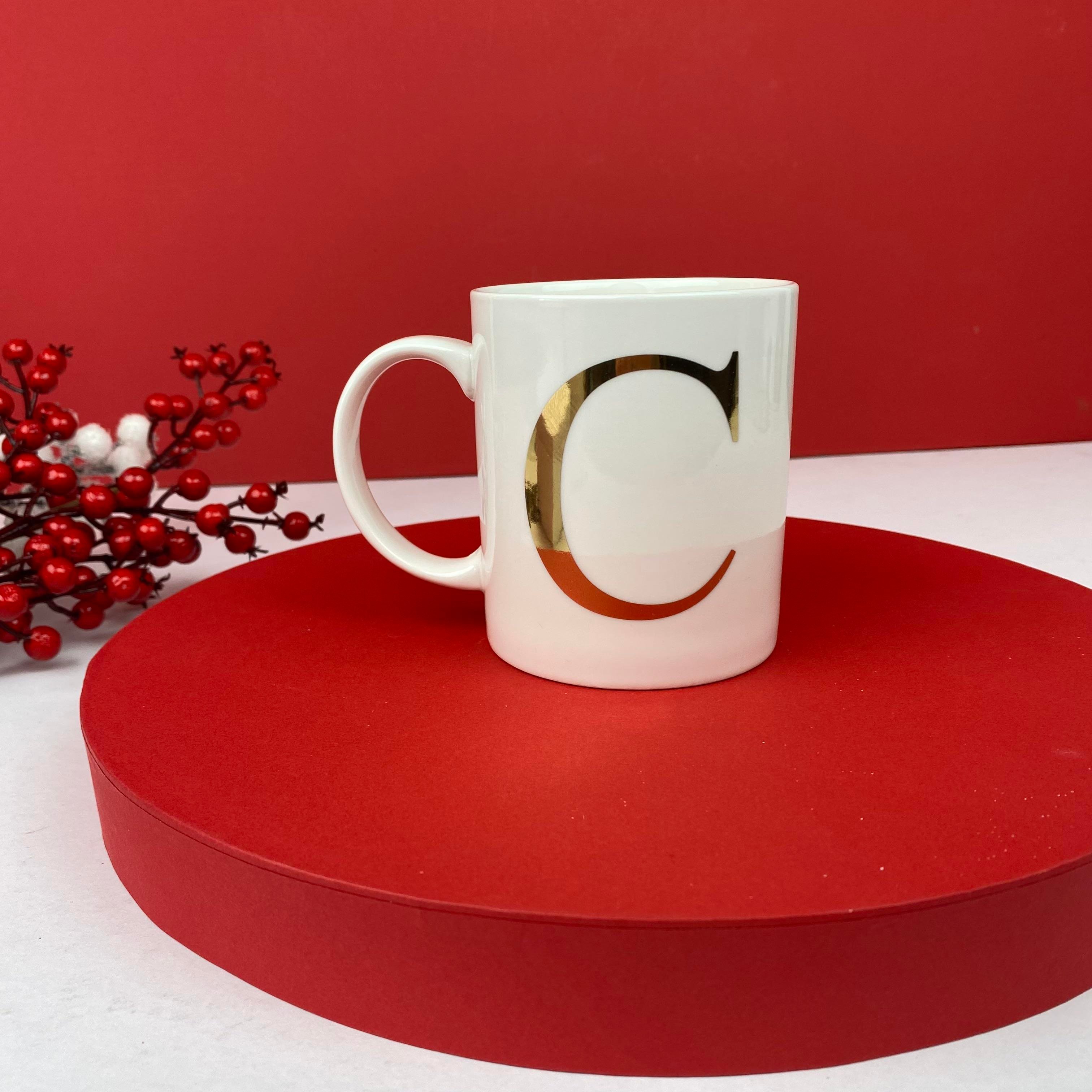 Beyaz porselen harfli kupa bardak