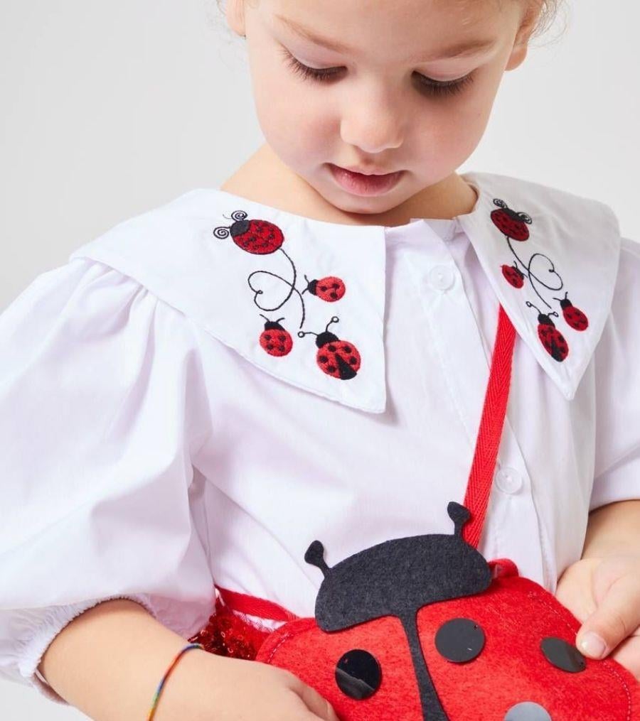 KIRMIZI PULLU ETEKLİ ÇANTALI TAKIM