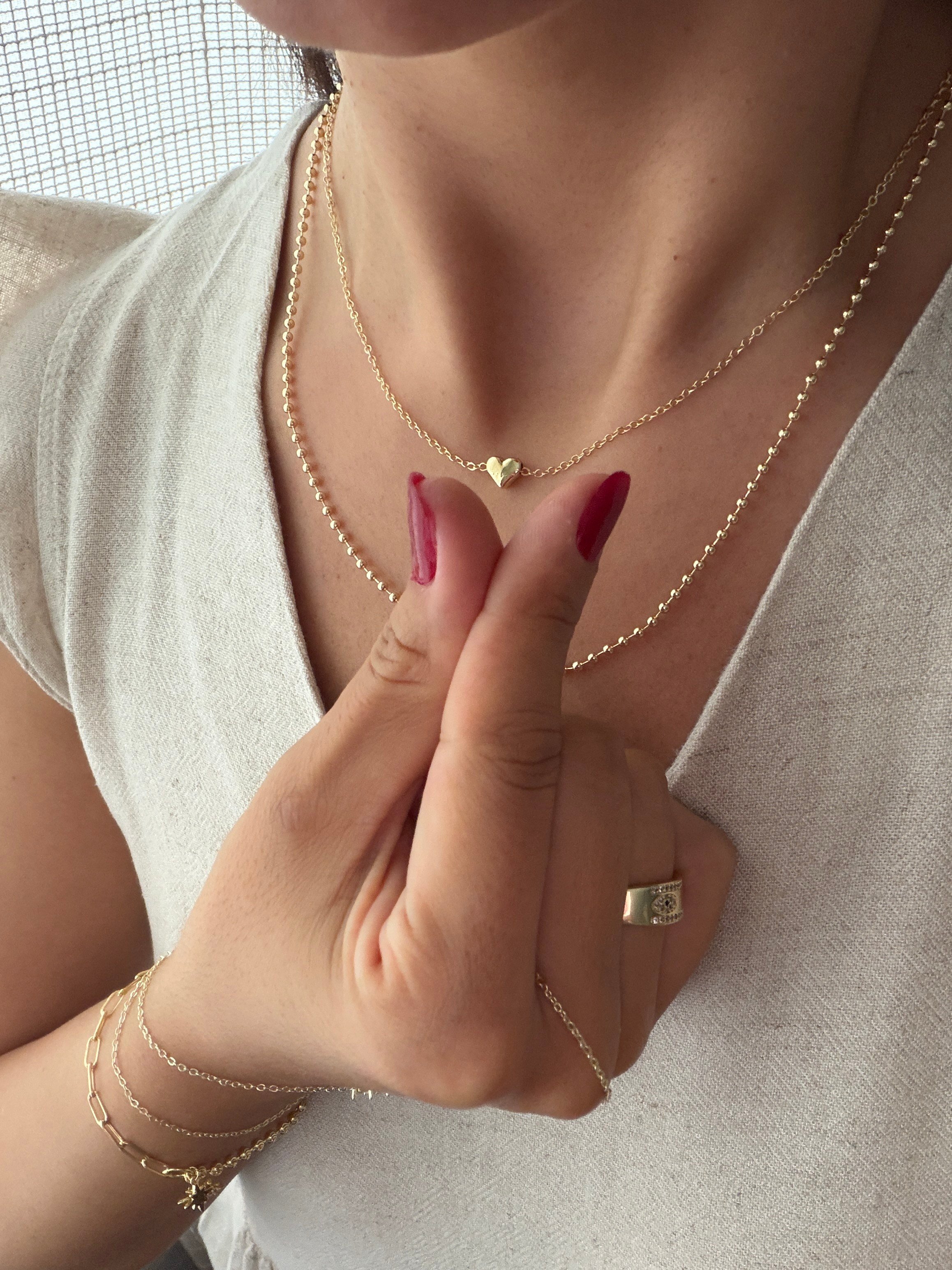 14K gold renk,en minimal naif 2'li kolye