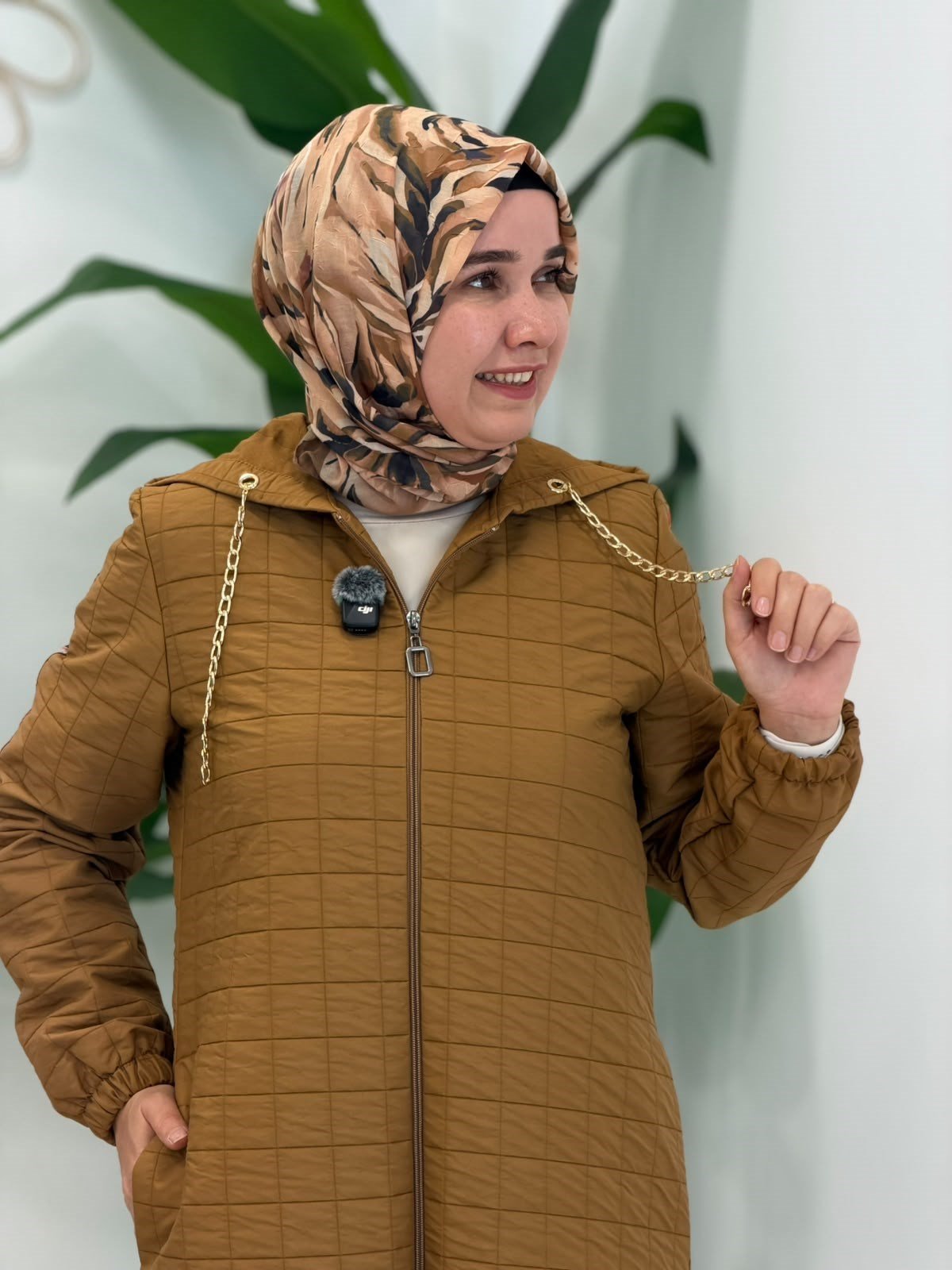 Taba Zincir Detaylı Kapitone Uzun Kap