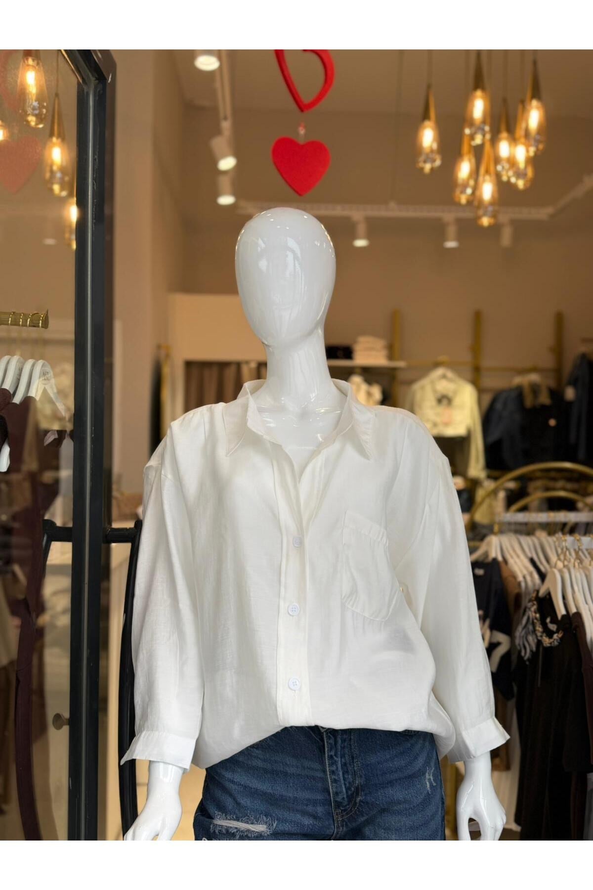 kadin-beyaz-oversize-salas-gomlek-cepl-ab3df6.jpg
