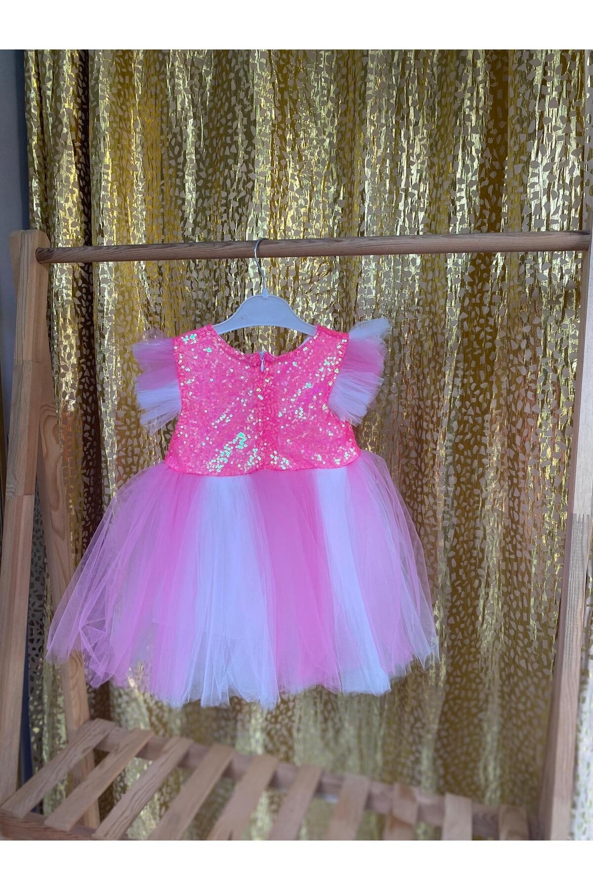 etekli pembe elbise