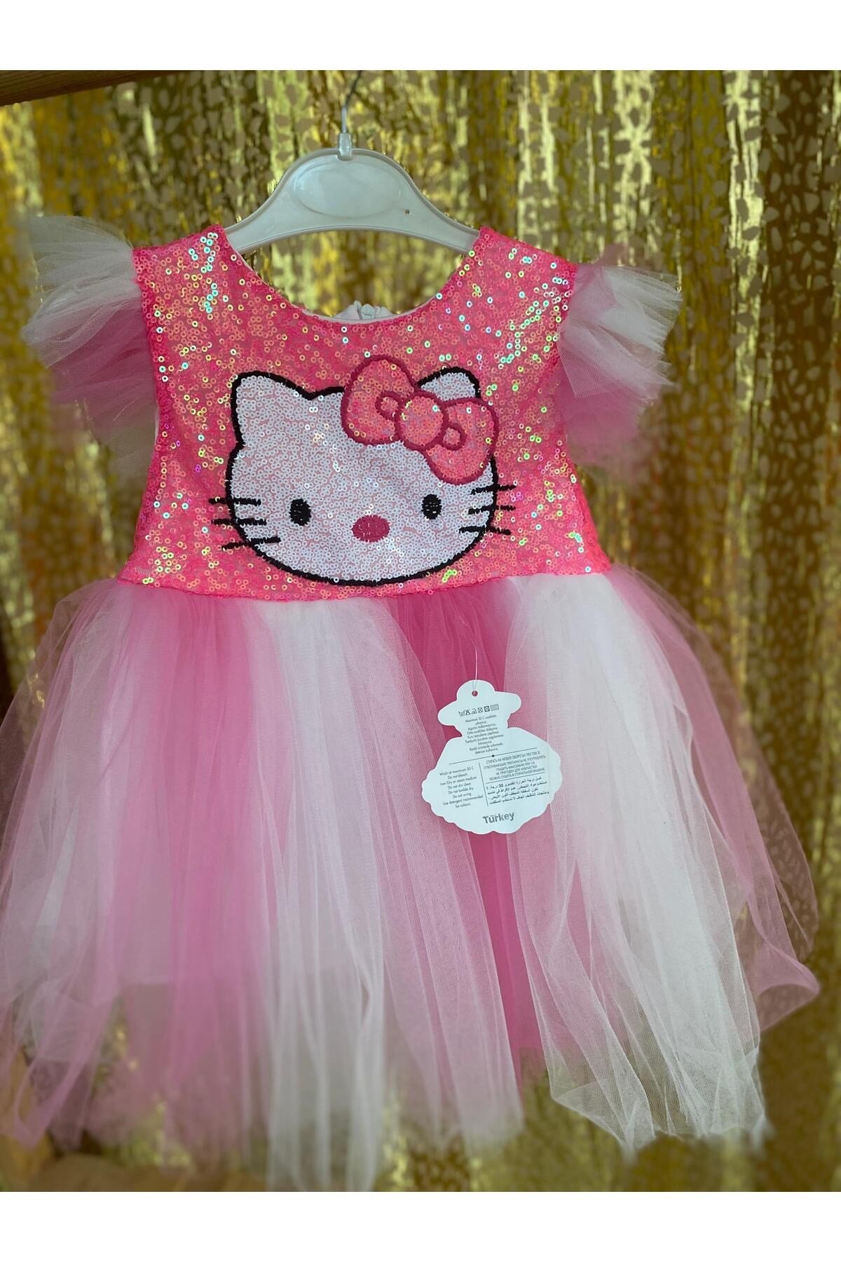 etekli pembe elbise