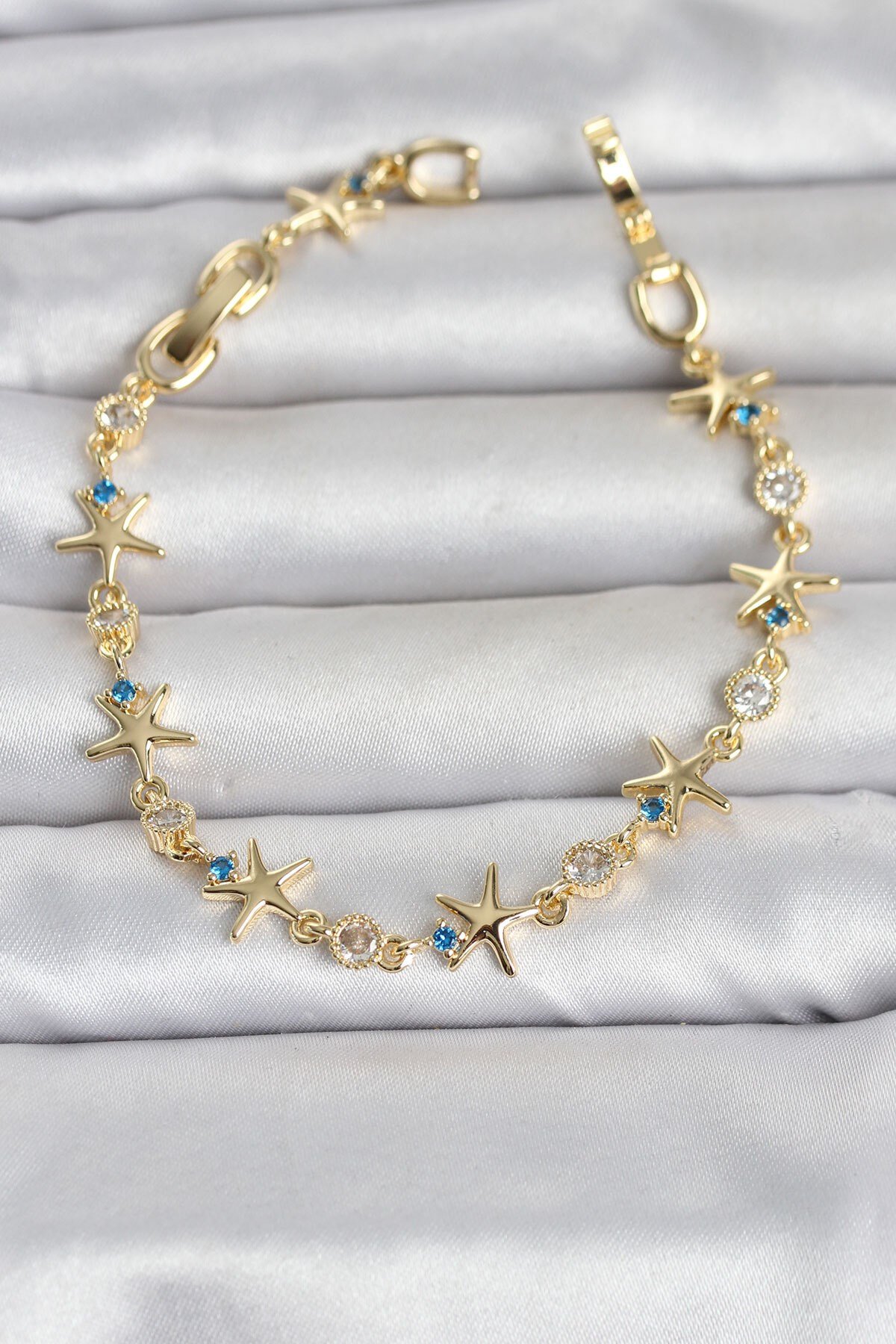 Pirinç Gold Renk Sıralı Deniz Yıldızı Model Kadın Bileklik