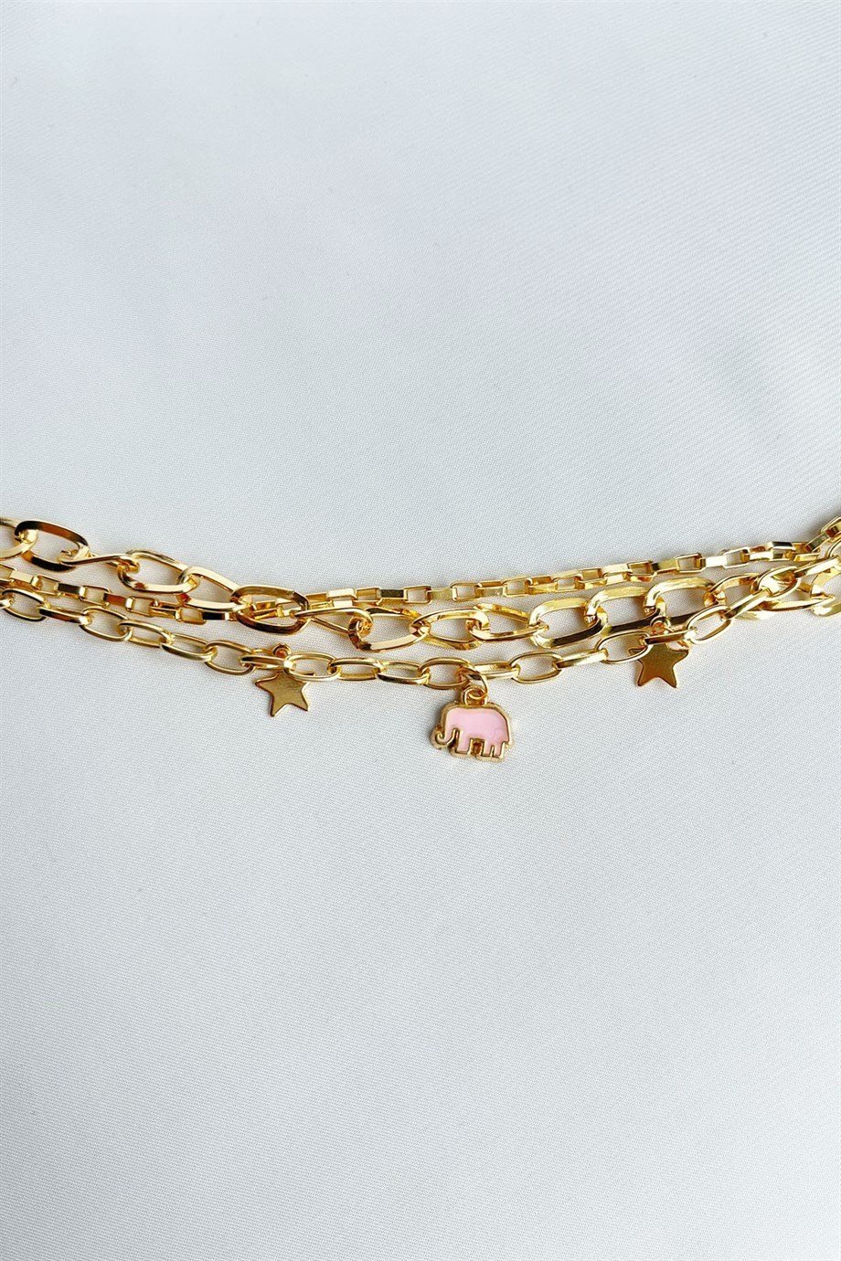 Pembe Fil Detaylı Üçlü Gold Bileklik