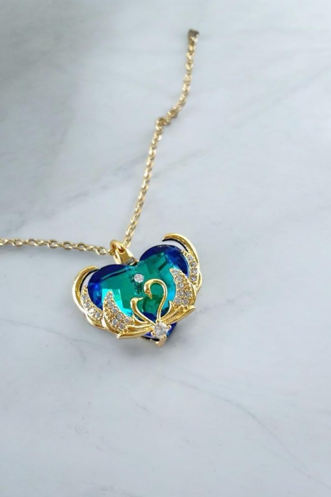 Çelik İkili Kuğu Detaylı Mavi Kristal Kalp Kolye Gold