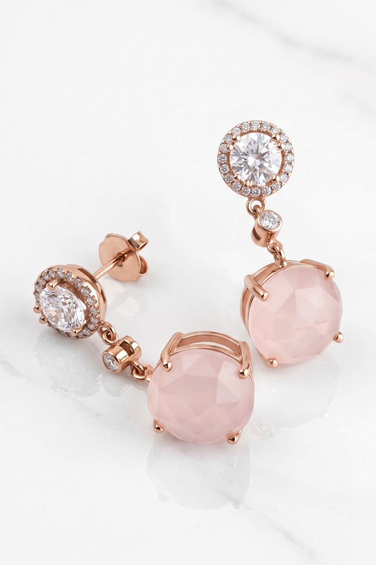 Pembe kuvars taşlı 925 ayar gümüş üzerine rose altın kaplama küpe