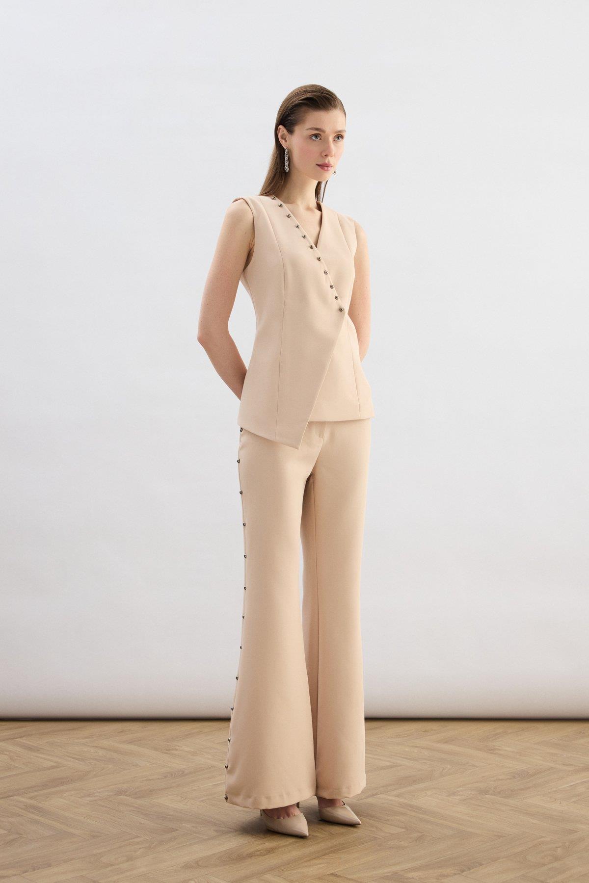 Wholesale Women's Beige Flared Trousers with Pearl Embellishment on the Sides 0033-1926-5545