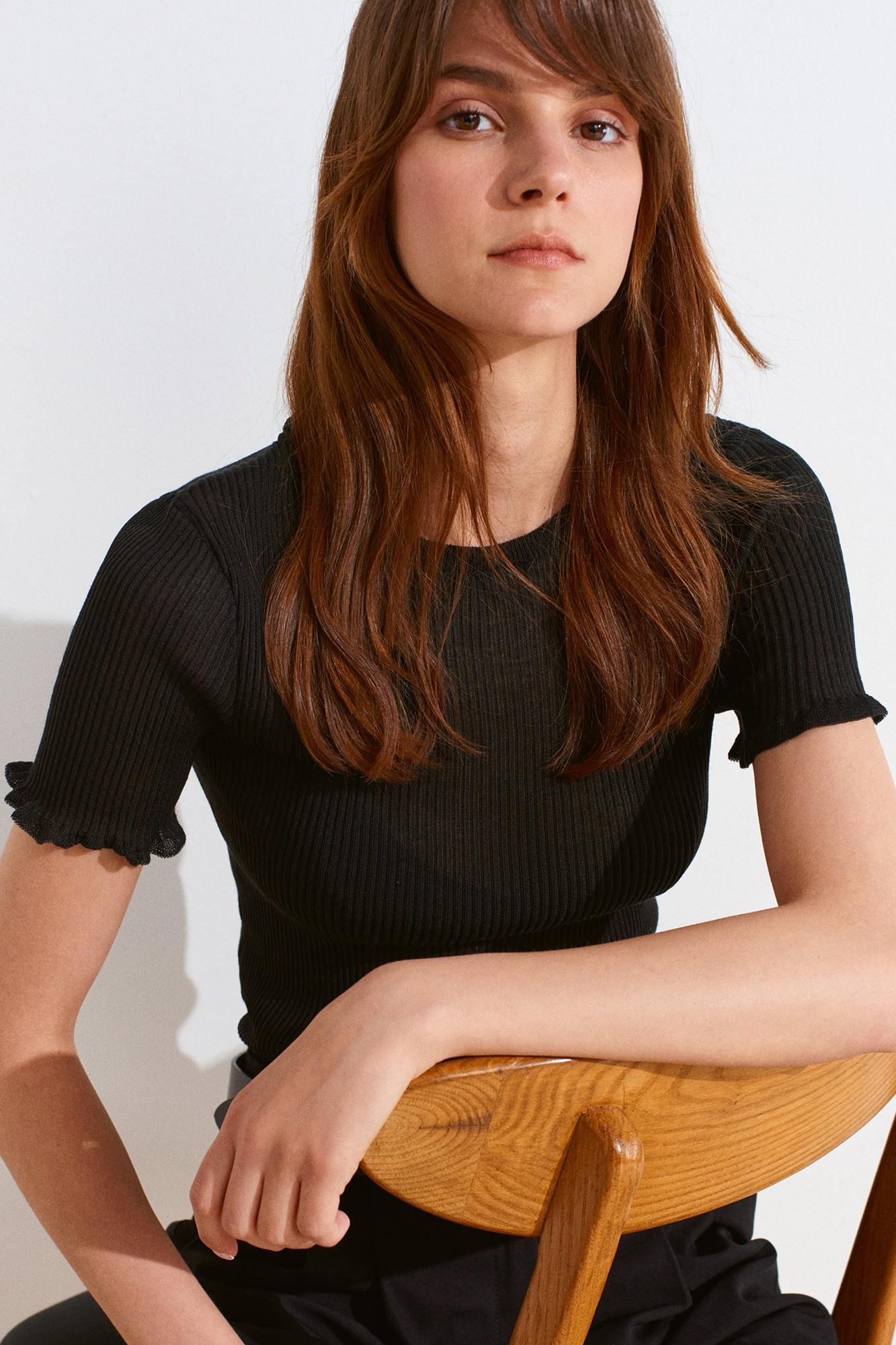 Wholesale Women's Black Short-Sleeve Fine Knit Crew-Neck Blouse with Ruffled Trim 0431W26-10783