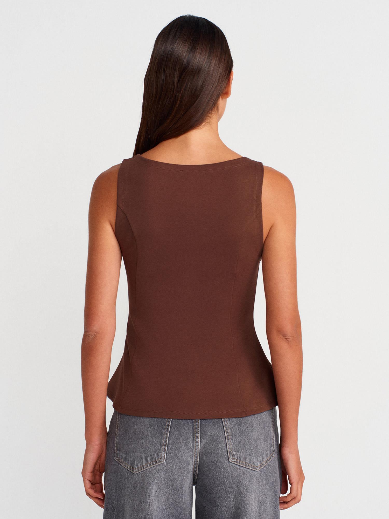 Wholesale Women's Brown Sleeveless Boat-Neck Peplum Blouse 0431-21001