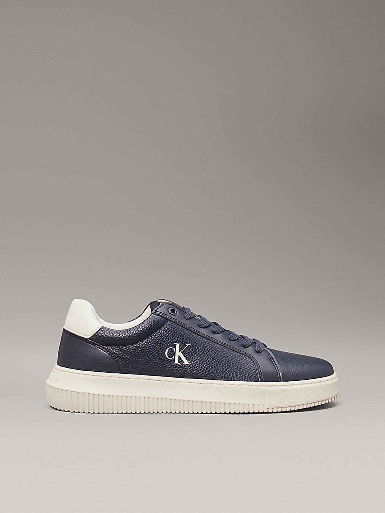 Calvin Klein Calvin Klein Erkek Düşük Bilekli Deri Rahat ve Düz Tabanlı Logo Kabartmalı Lacivert Sneaker YM0YM01198-0G1