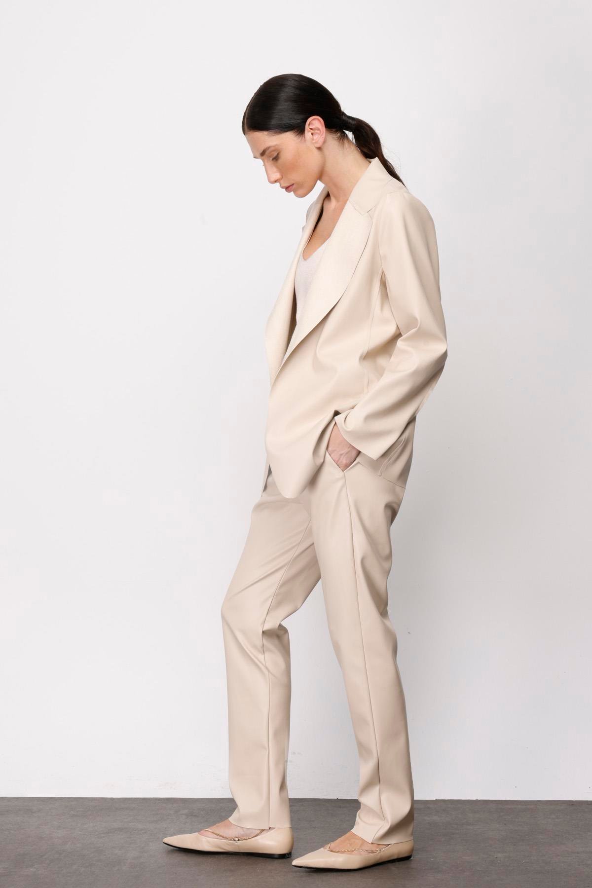 DERİ YANDAN CEPLİ BELİ LASTİKLİ PANTOLON