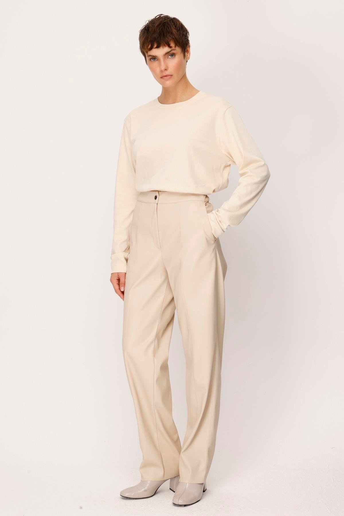 DERİ YANDAN CEPLİ BELİ LASTİKLİ PANTOLON