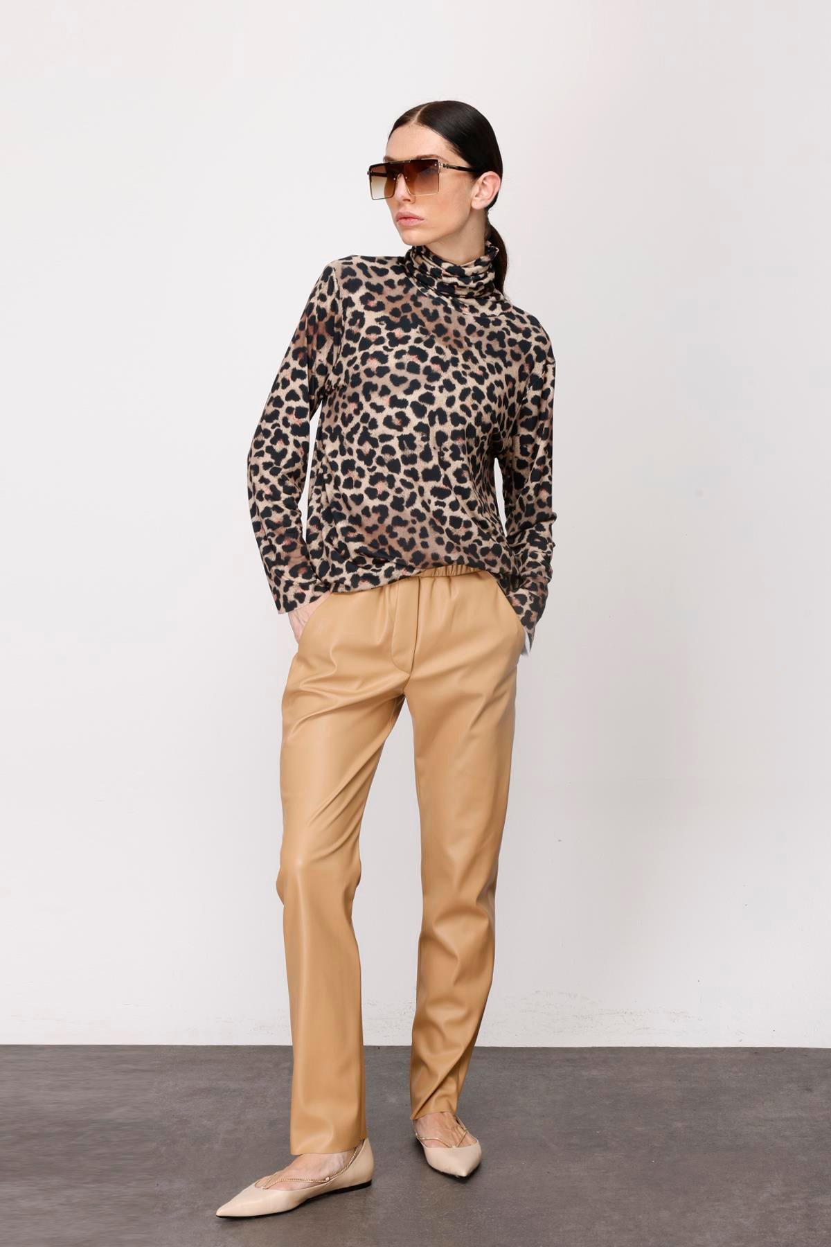 DERİ YANDAN CEPLİ BELİ LASTİKLİ PANTOLON