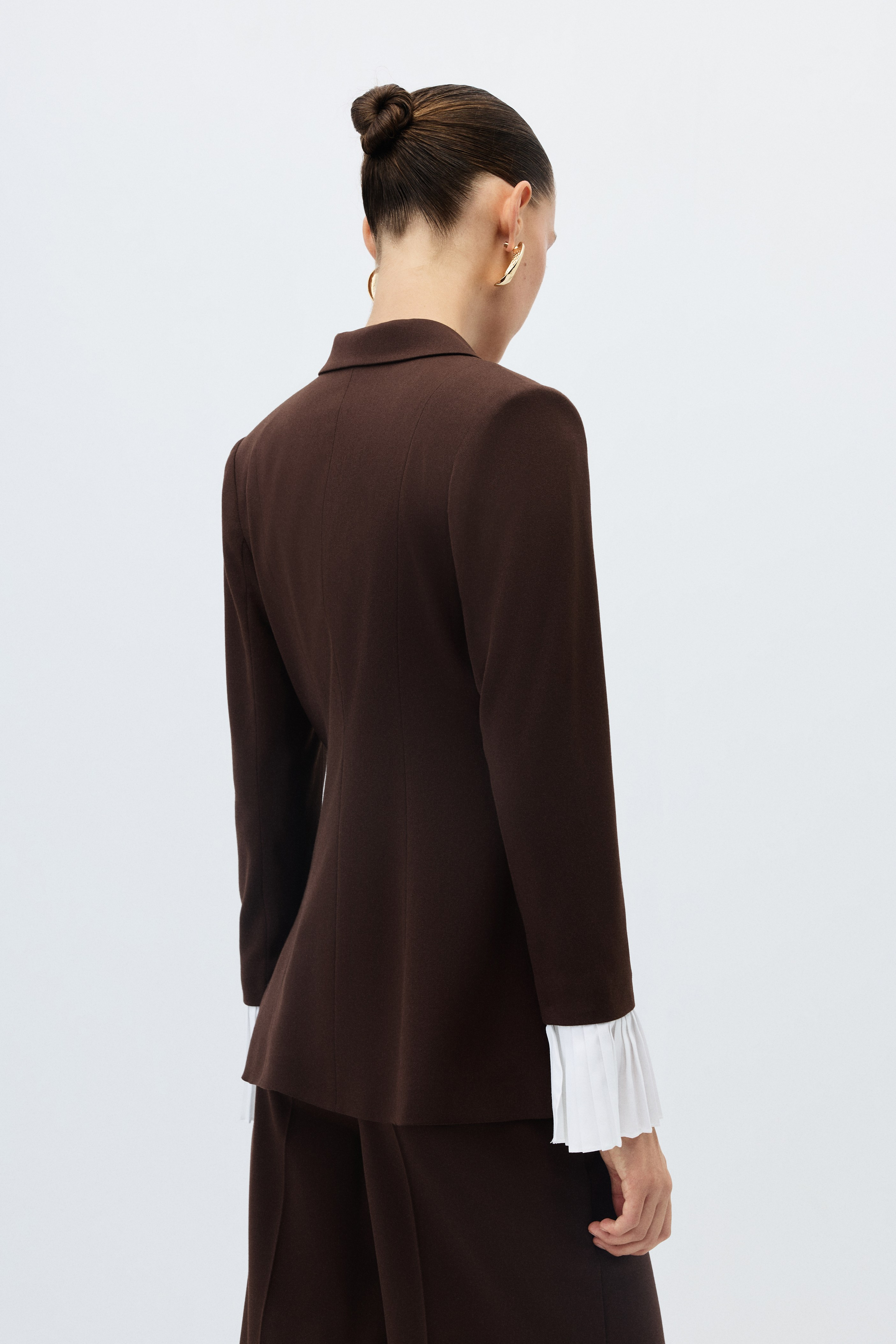2124-0306 SUIT (P)